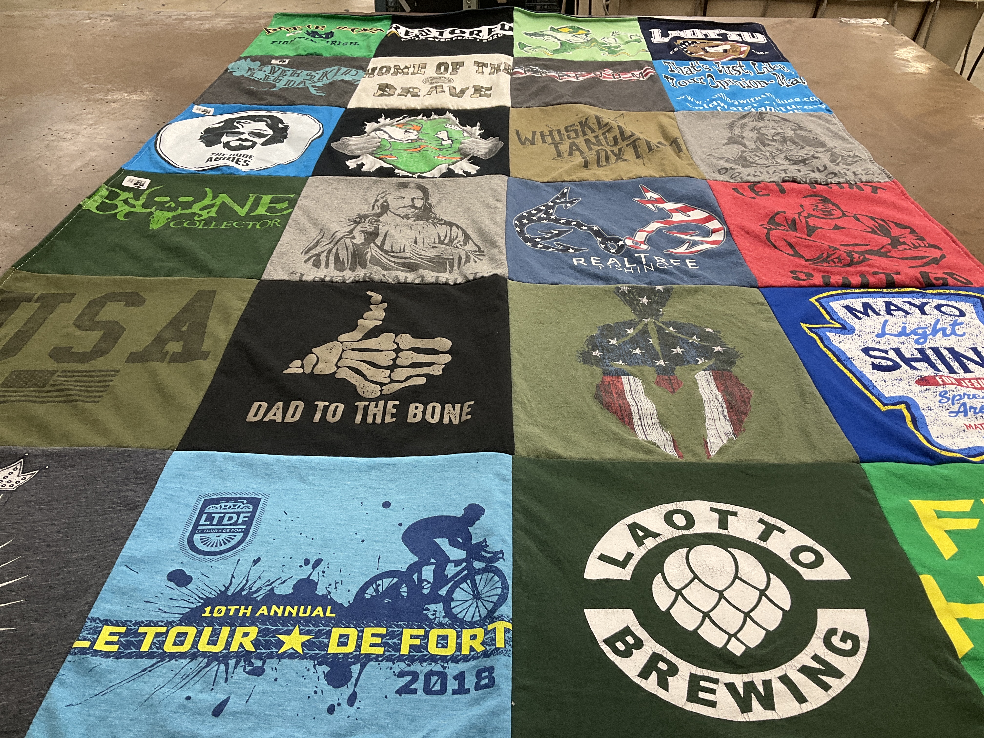 T-shirt quilt with brewing, cycling themes by Brett from IN