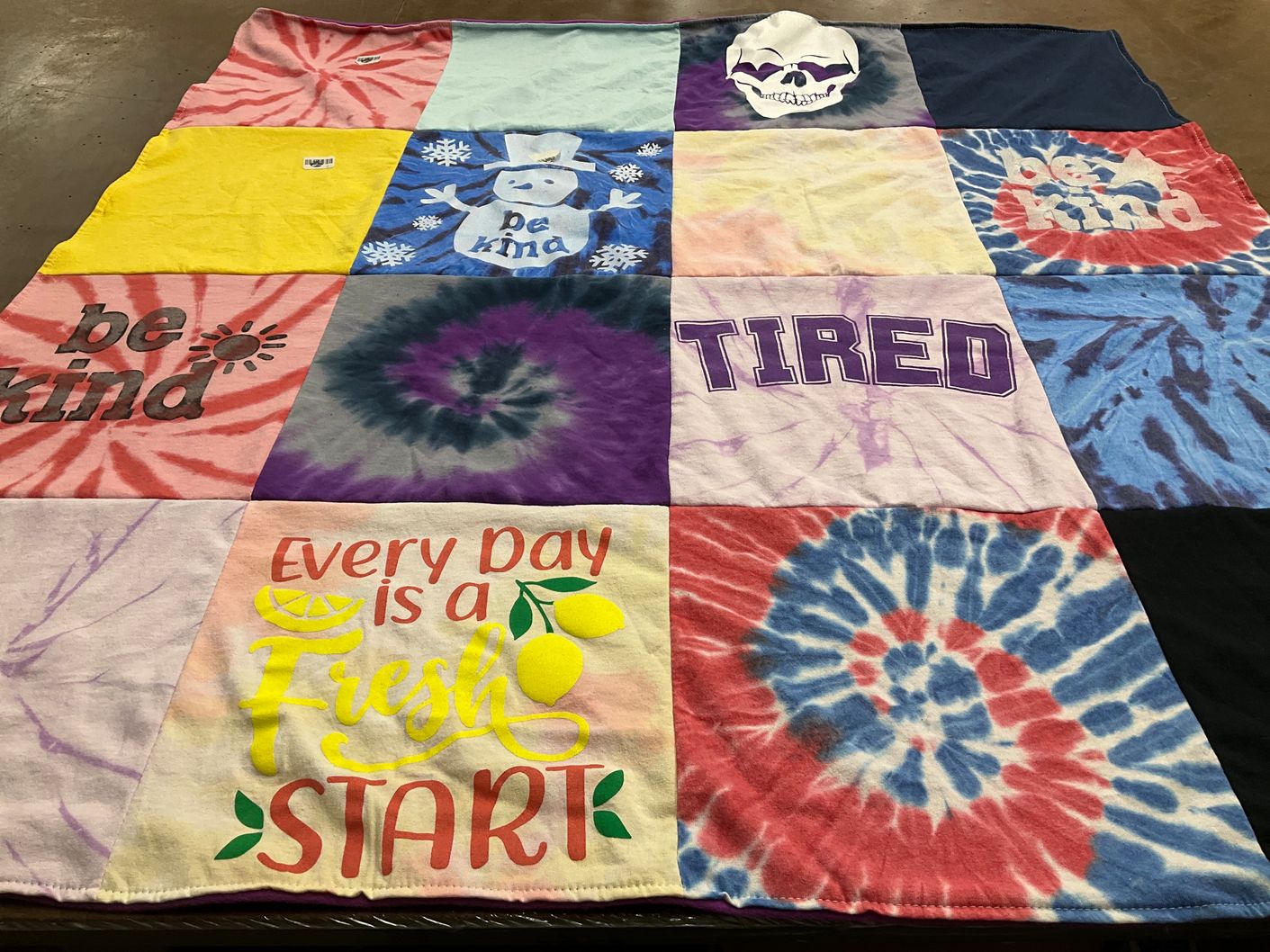 T-shirt quilt with positivity, self-care themes by Joan from FL
