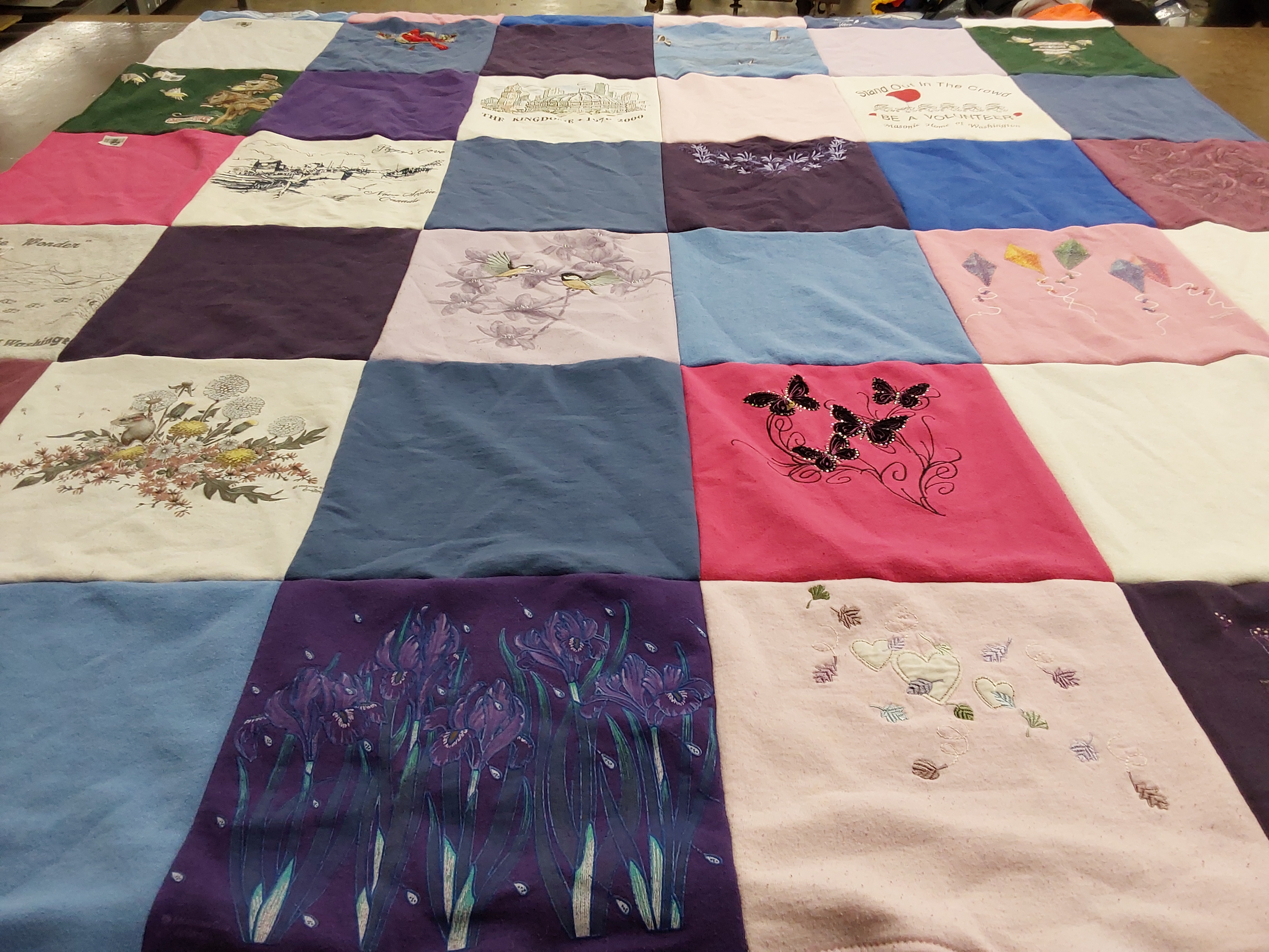 T-shirt quilt with gardening, nature themes by Lois from WA