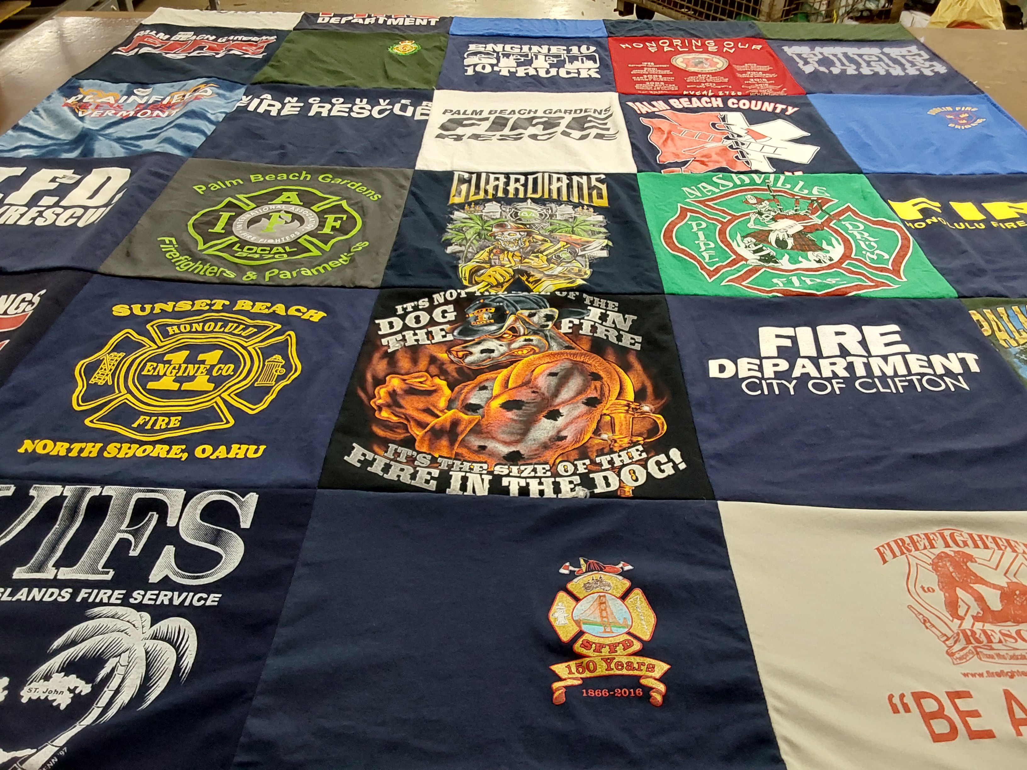 T-shirt quilt with firefighting, emergency services themes by Denise from FL