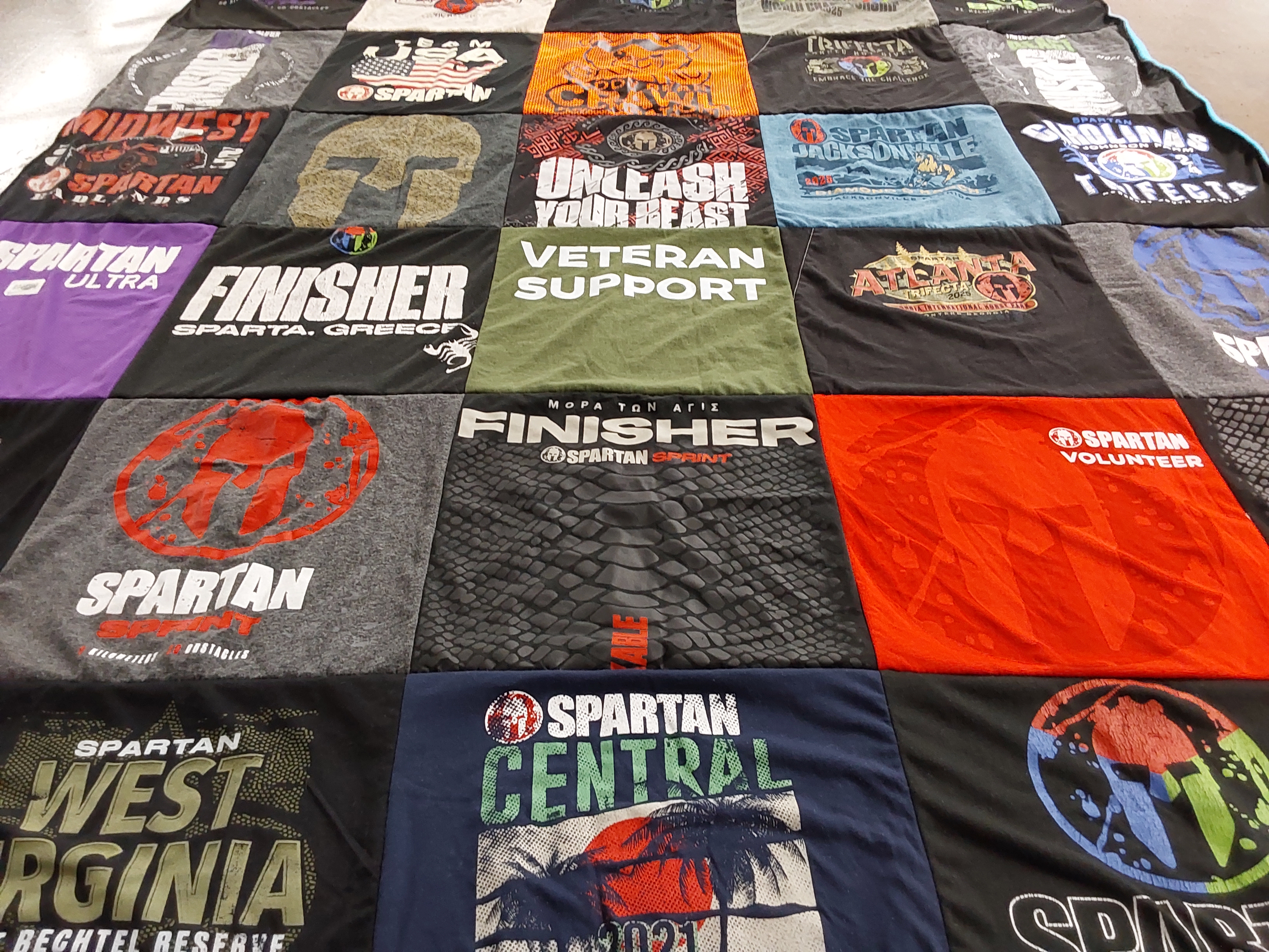 T-shirt quilt with obstacle course racing, fitness themes by elisabeth from GA