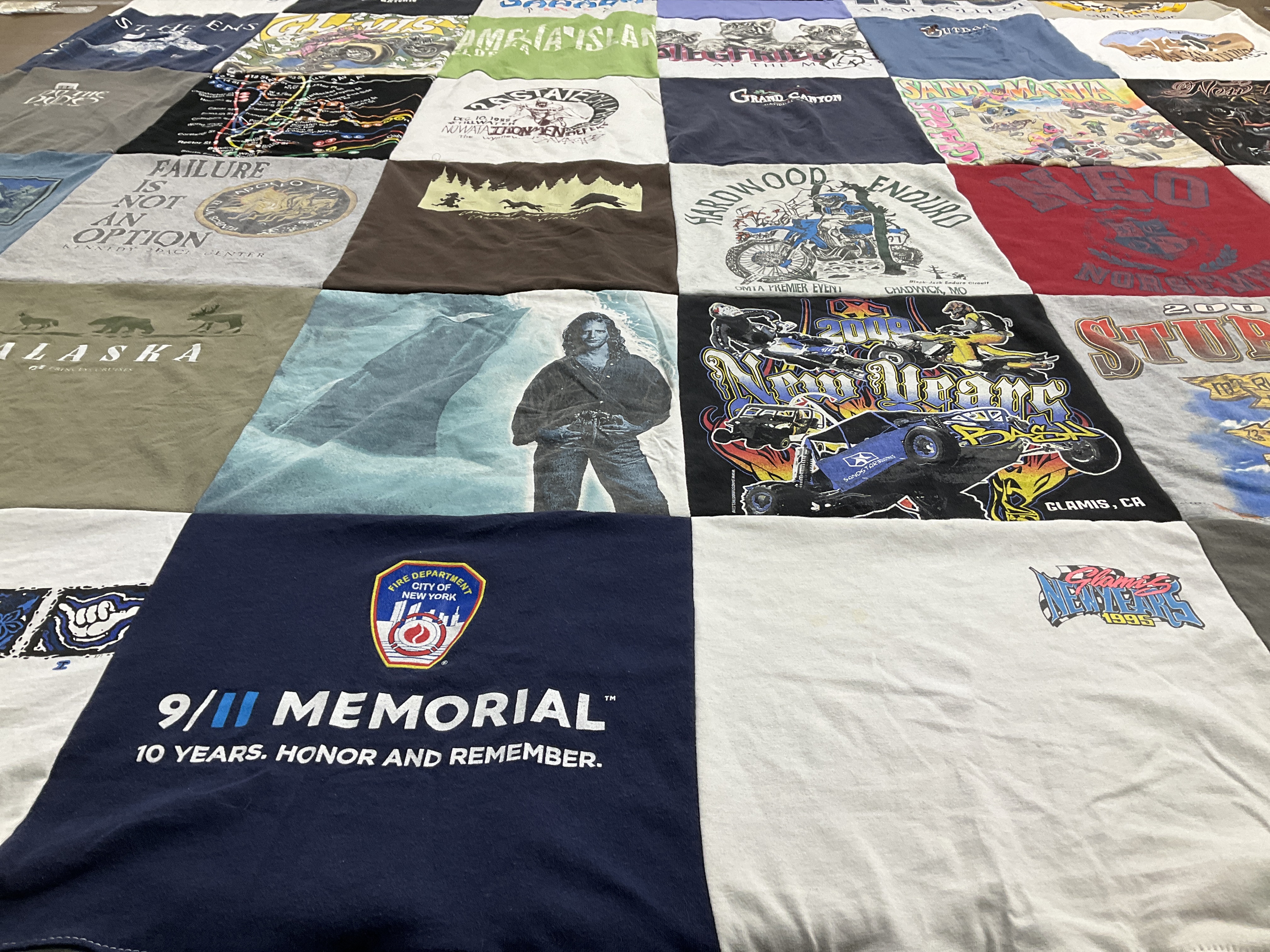 T-shirt quilt with travel, outdoor activities themes by Lisa from OK