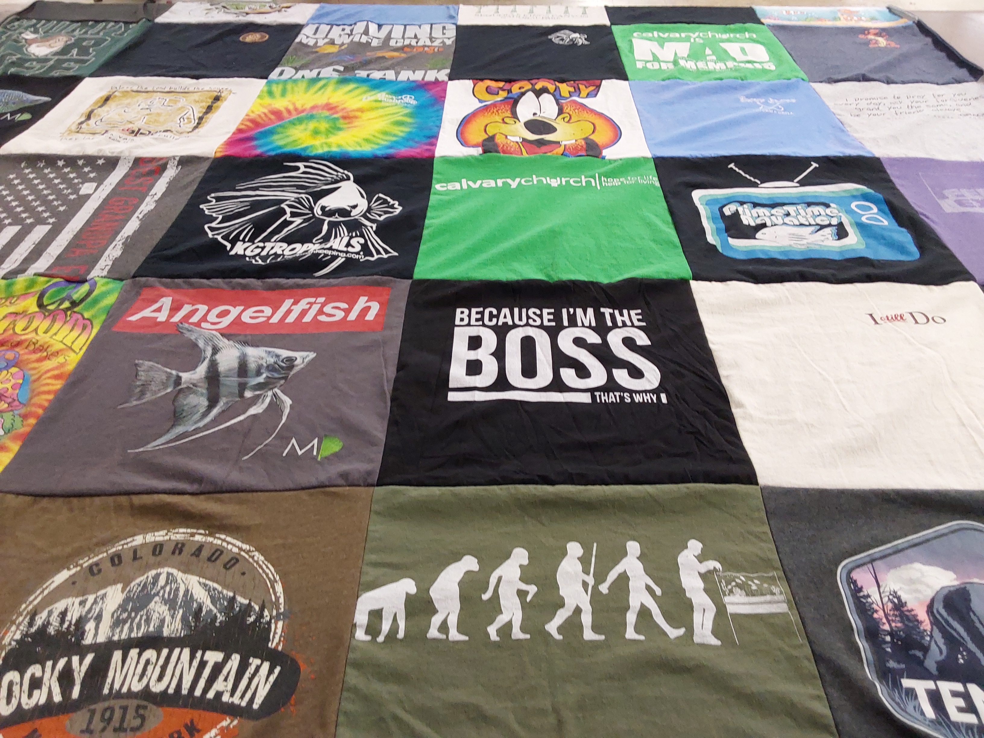 T-shirt quilt with fishing, mountains themes by Kimberley from TN