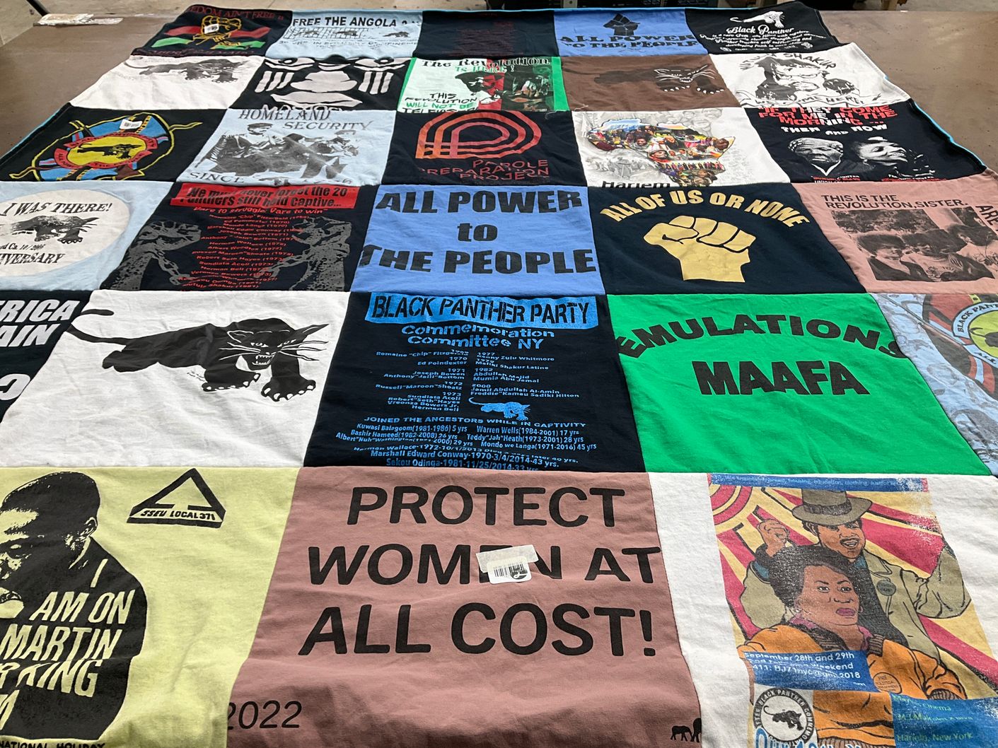 T-shirt quilt with social justice, activism themes by Yasmeen from NY