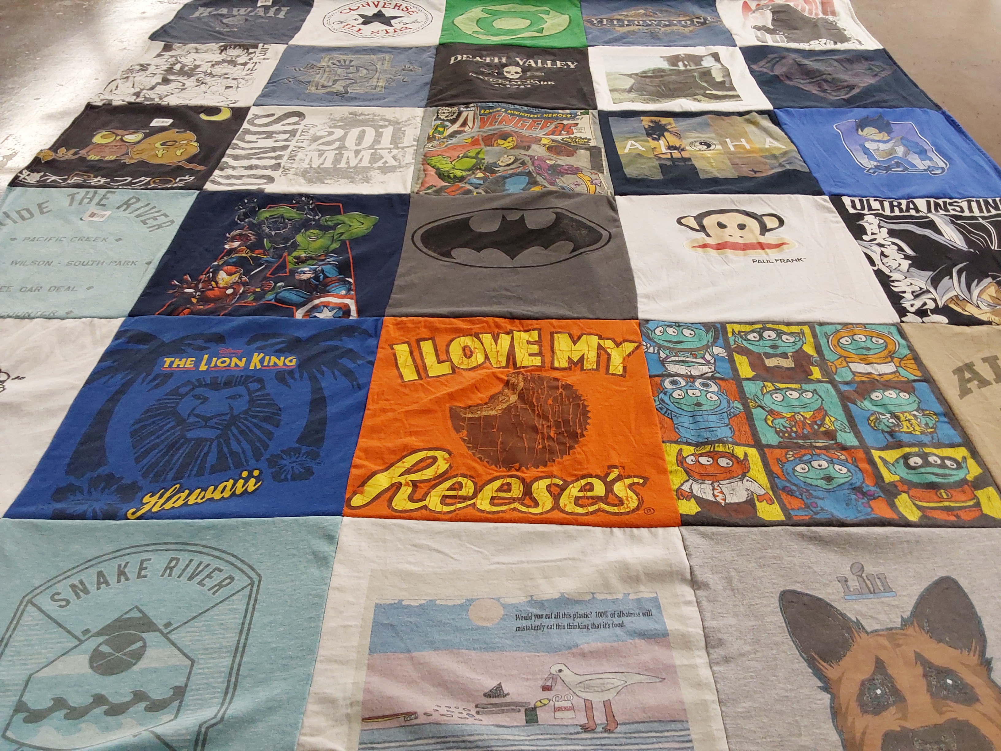 T-shirt quilt with anime, superheroes themes by Corinne from HI