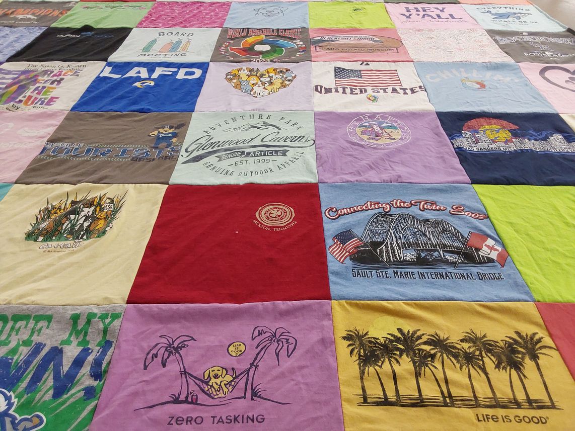 T-shirt quilt with outdoor activities, tourism themes by Cheryl from CA