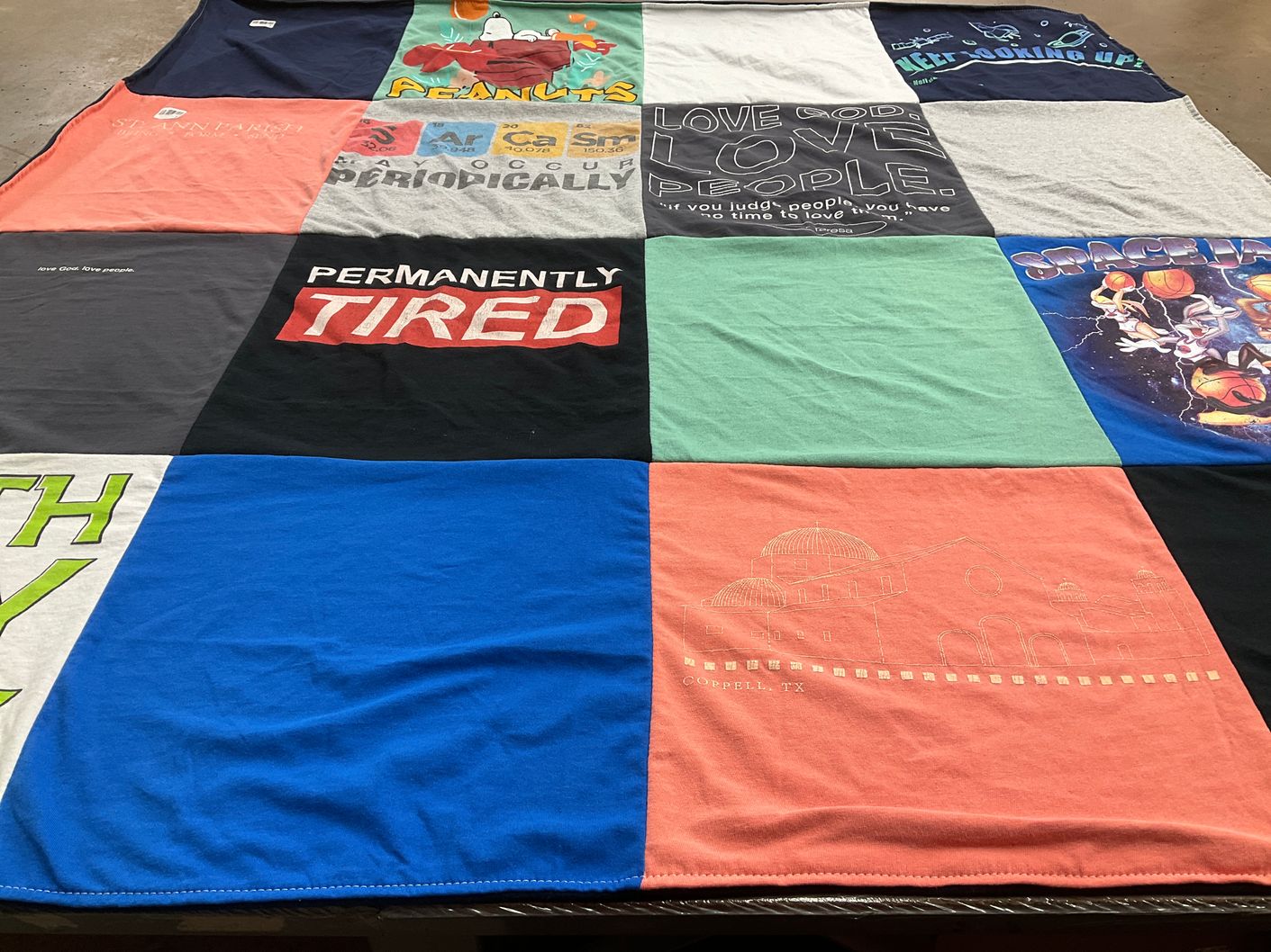 T-shirt quilt with cartoons, art themes by Maura from TX