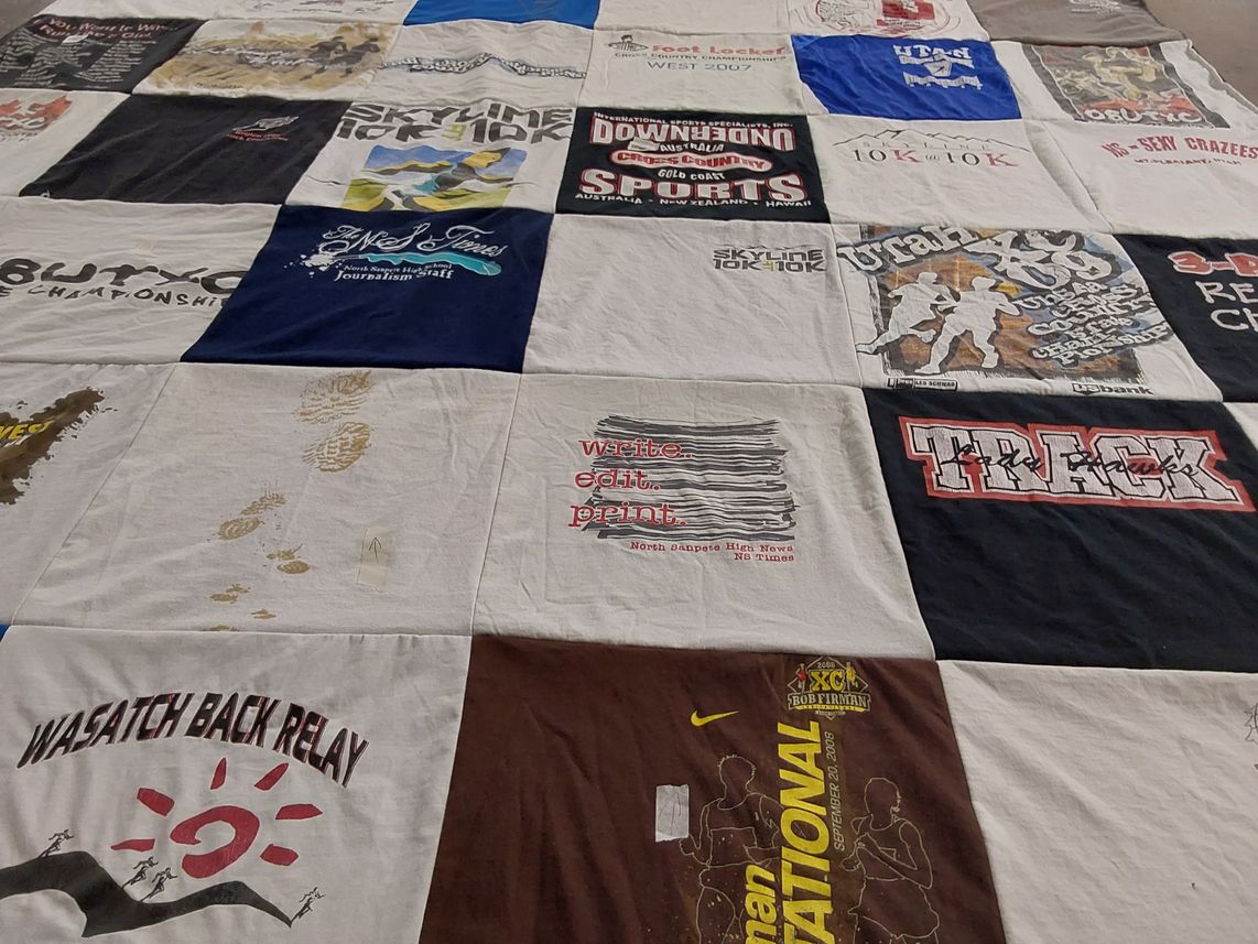 T-shirt quilt featuring wasatch back relay team, skyline university track team by Brandi from UT