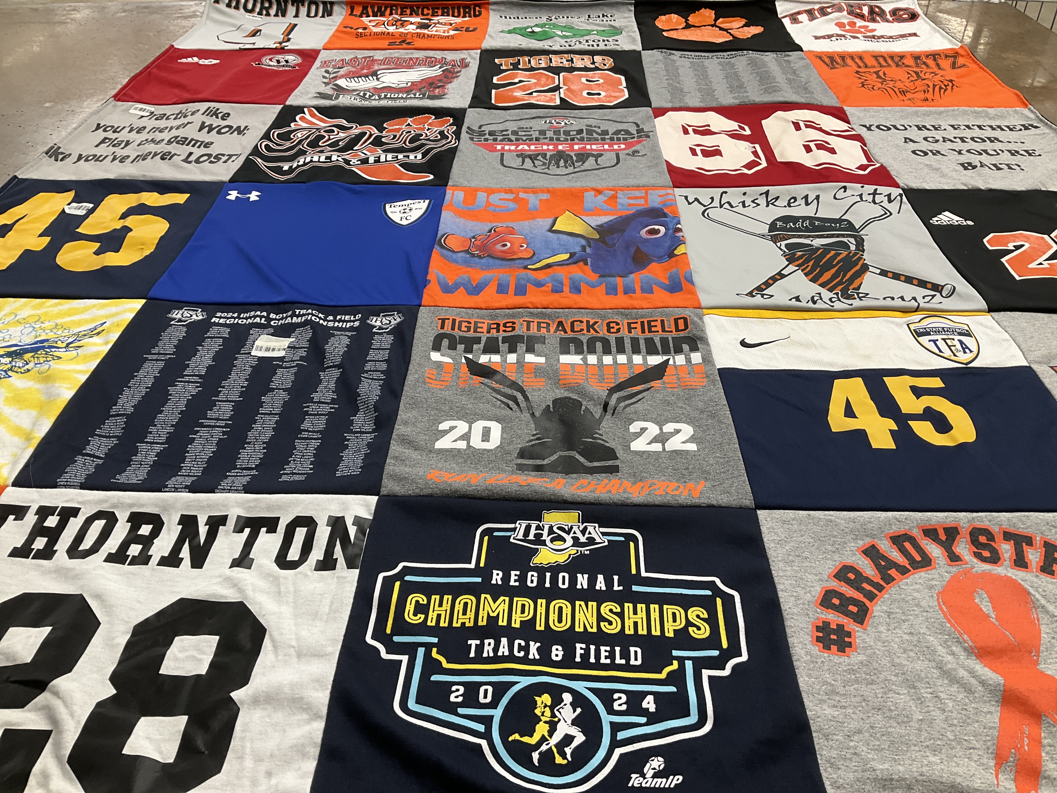 T-shirt quilt featuring tigers track and field, whiskey city track and field by Amy from IN
