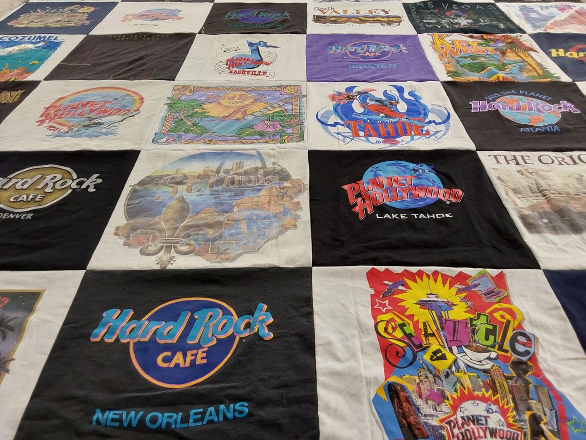 T-shirt quilt with travel, food themes by Cindy from MD
