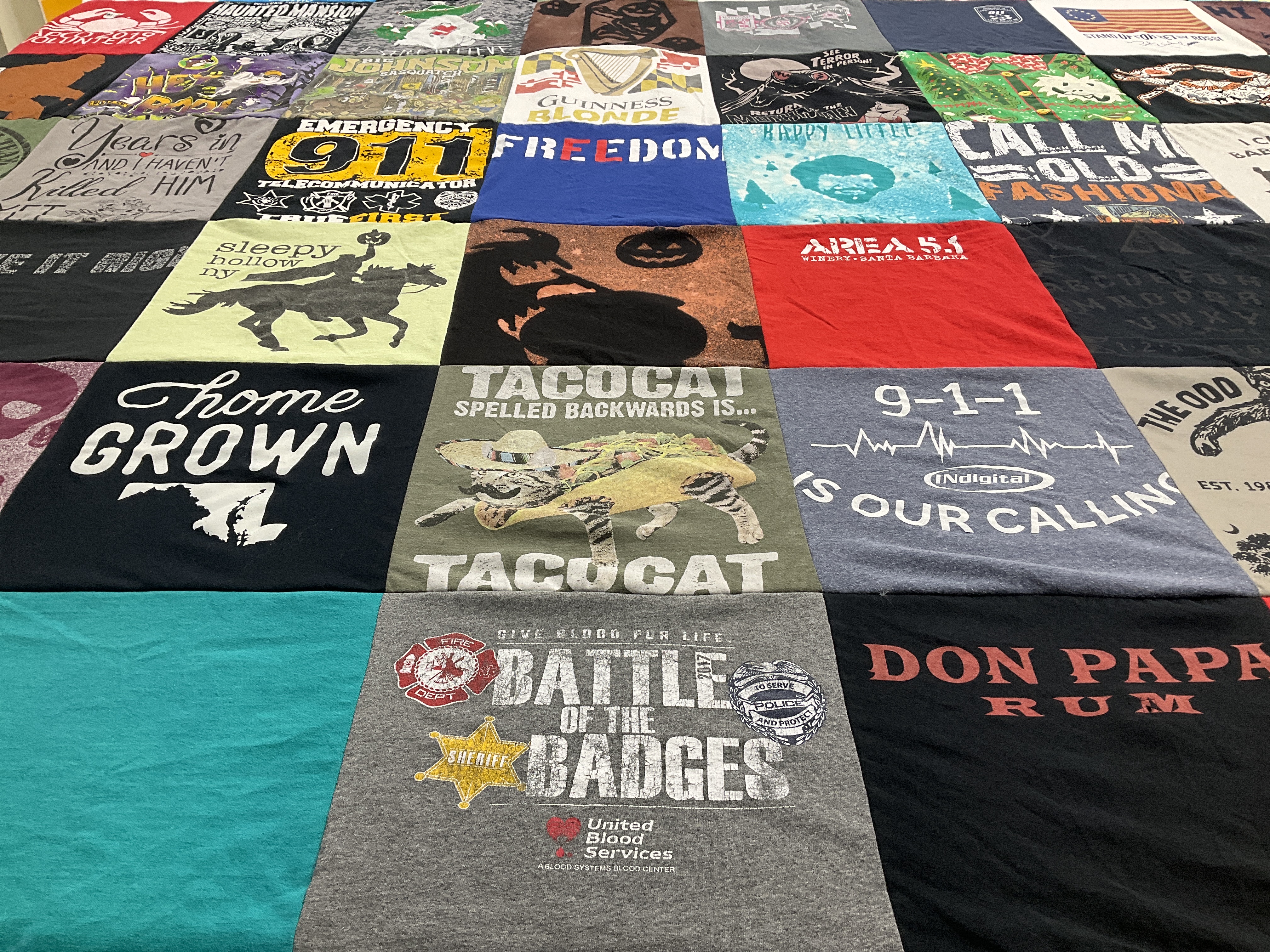 T-shirt quilt with emergency services, cats themes by Jill from TN