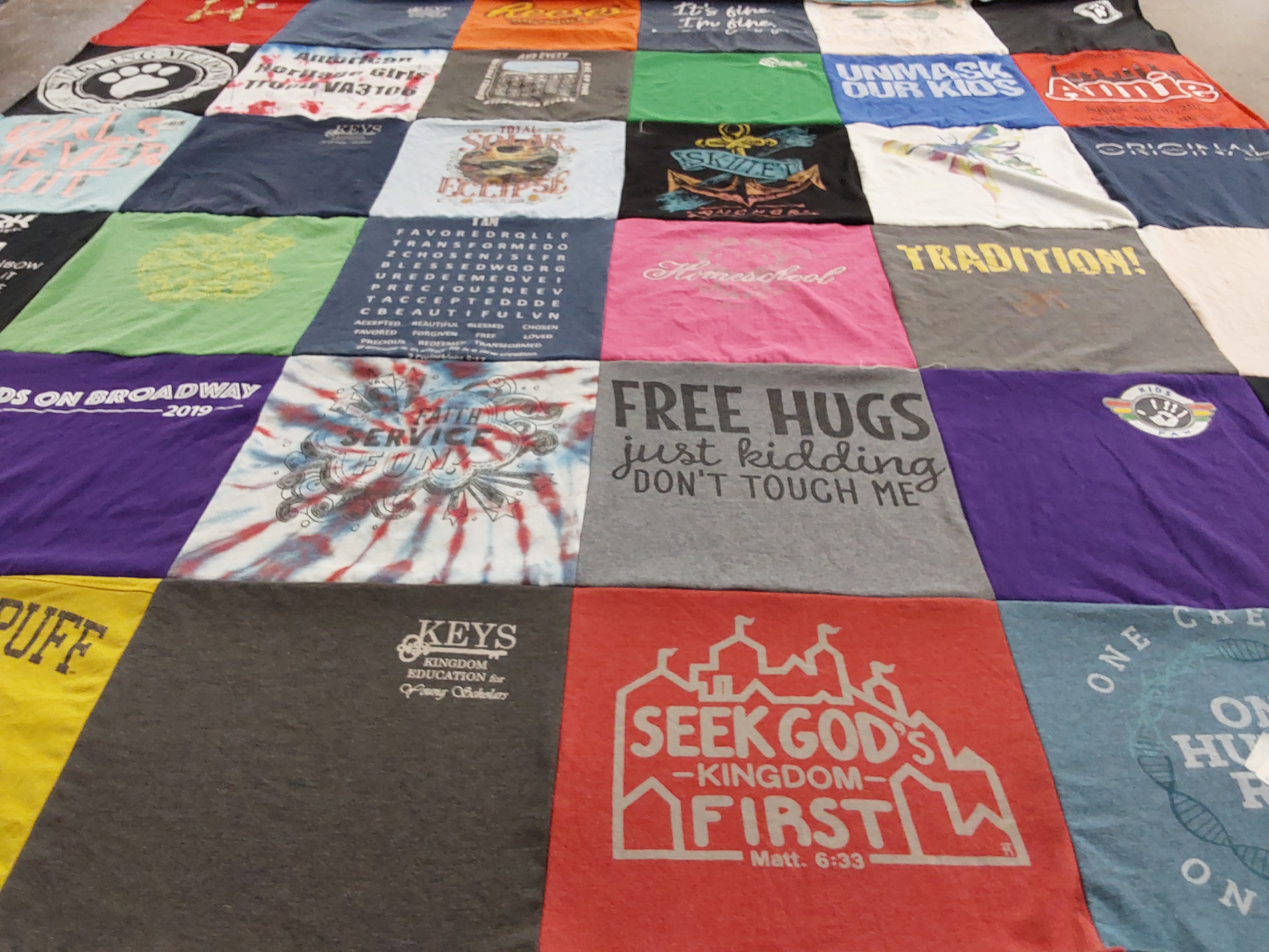 T-shirt quilt with education, community service themes by katherine from VA
