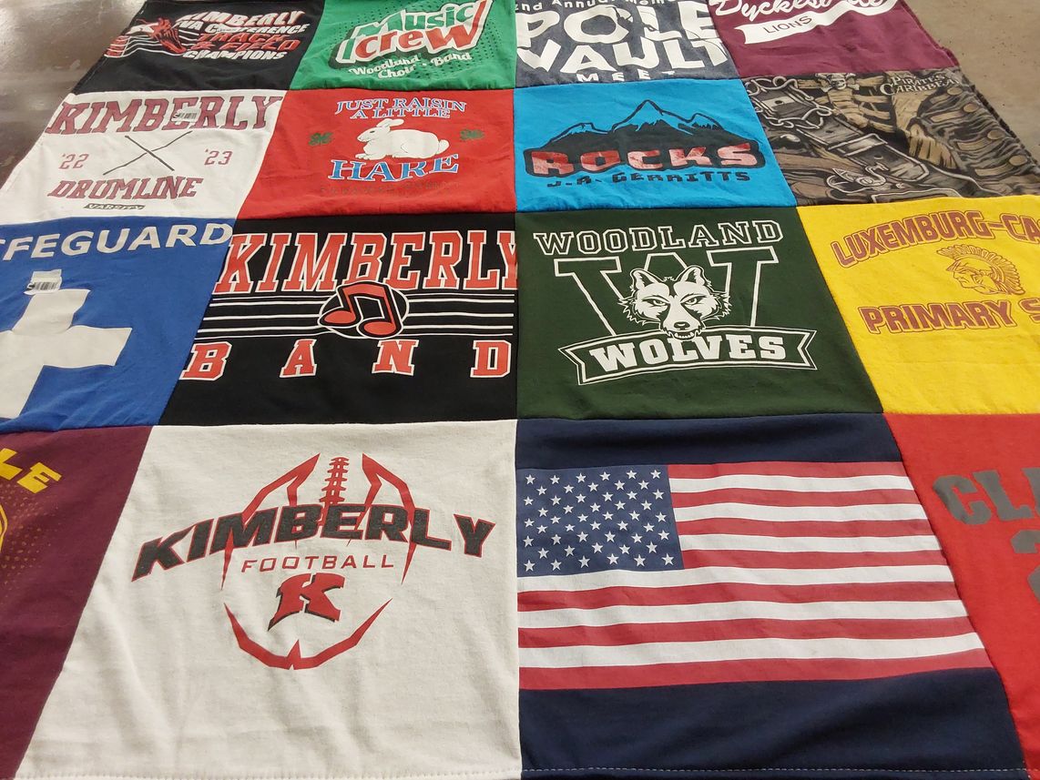 T-shirt quilt featuring kimberly football, woodland wolves by Angela from WI