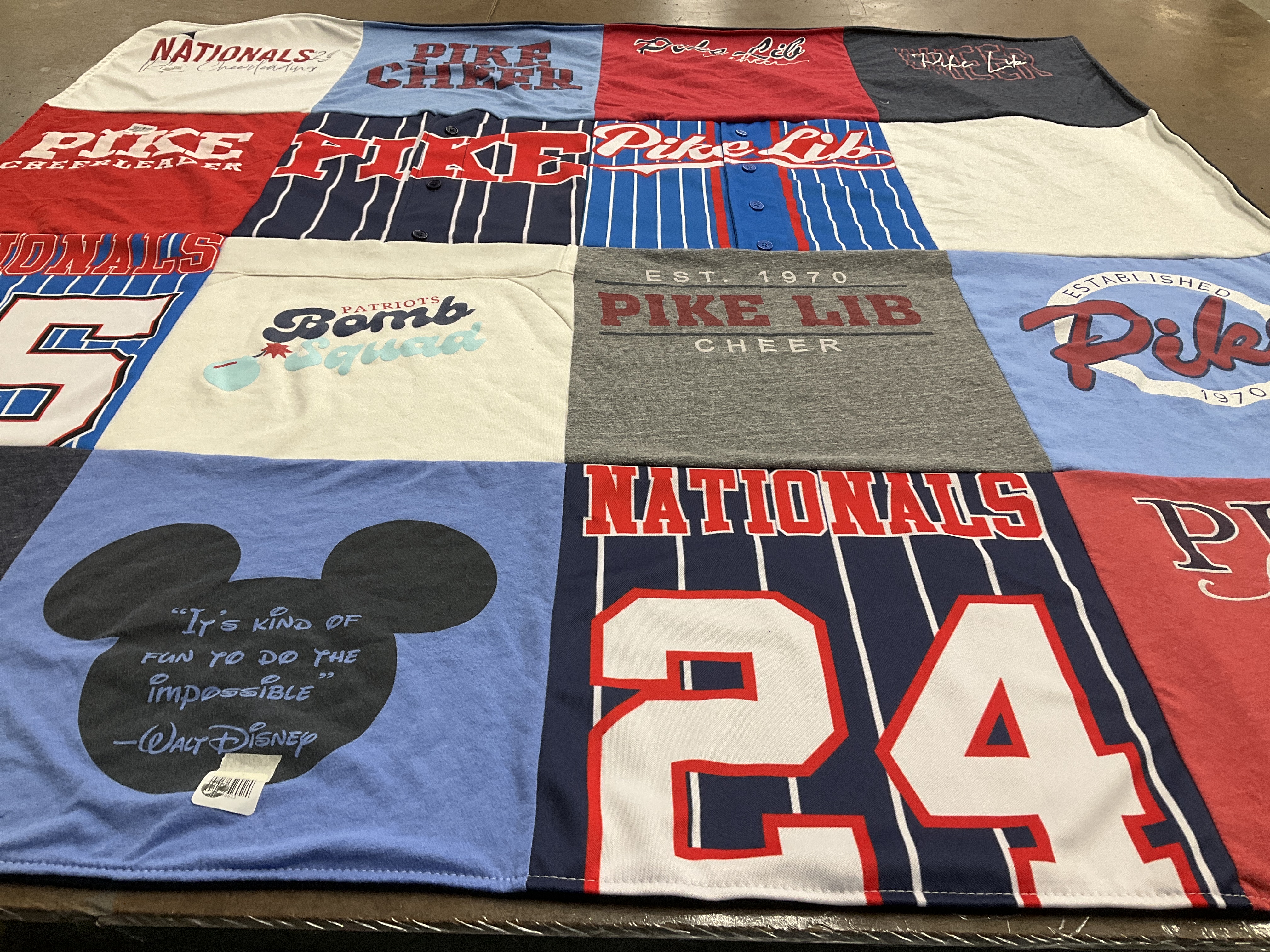 T-shirt quilt with sports, cheerleading themes by Katie from AL