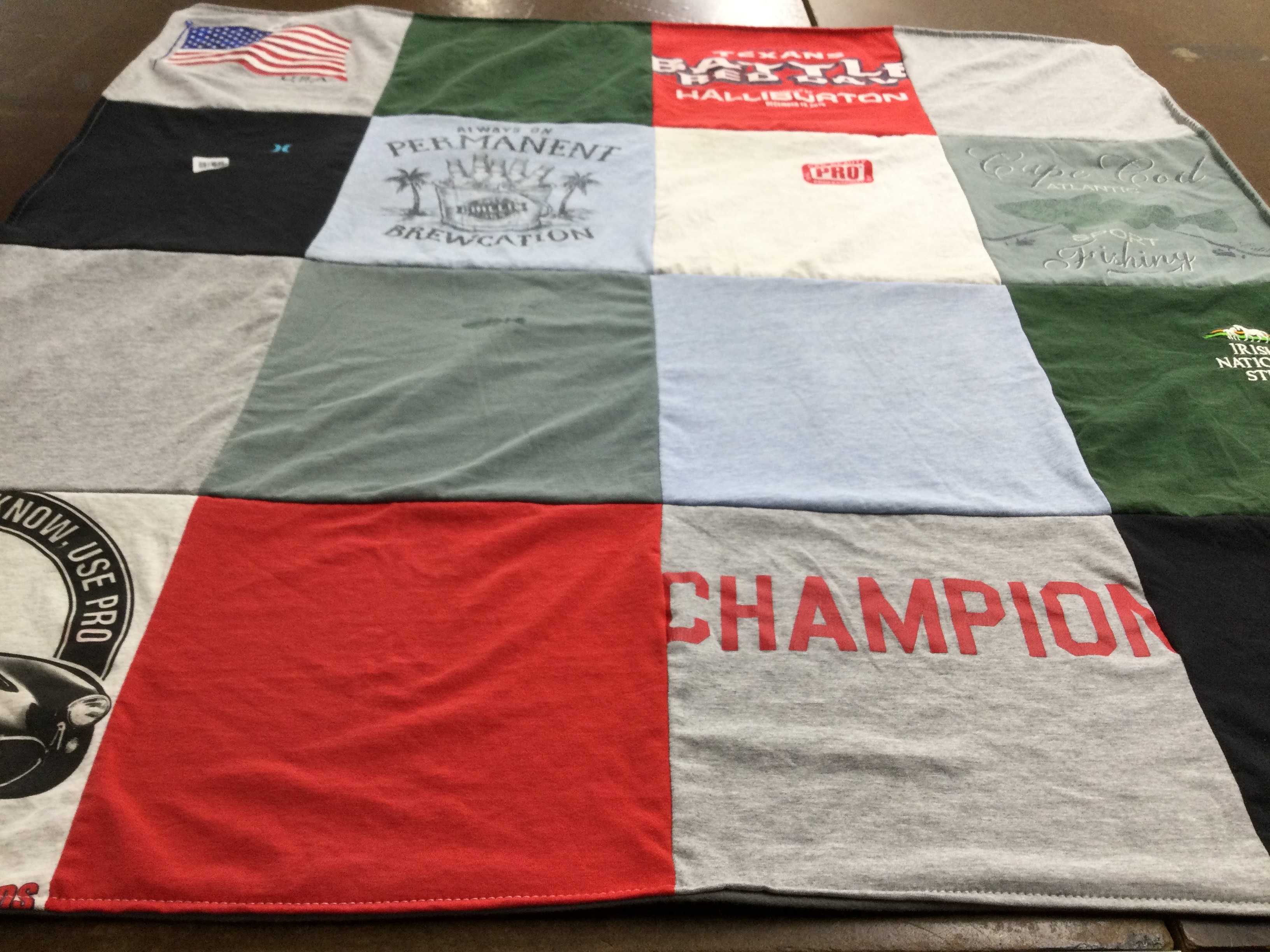 T-shirt quilt with fishing, brewing themes by Maureen from MA