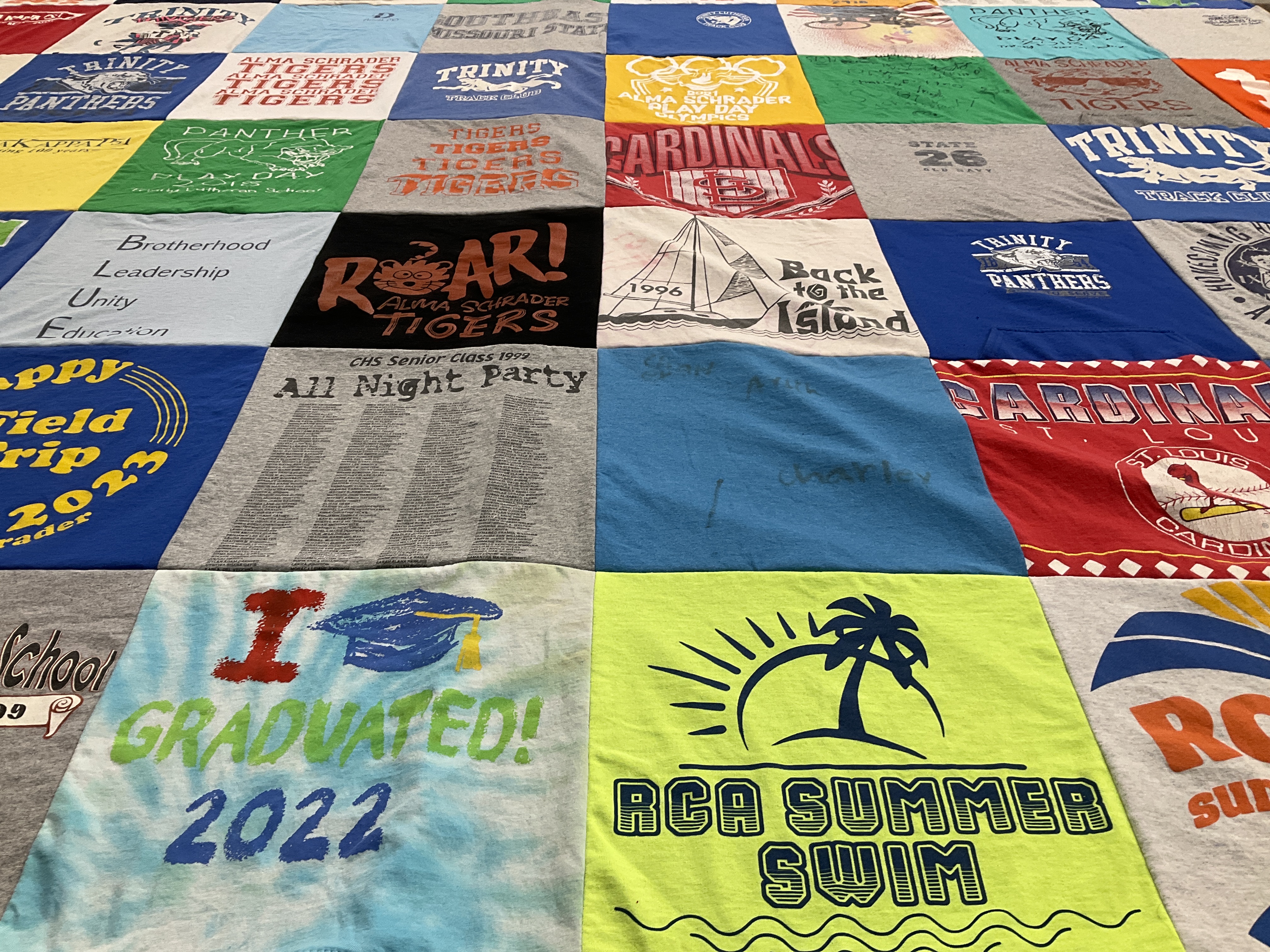 T-shirt quilt featuring alma schrader tigers, trinity panthers by Angie from MO