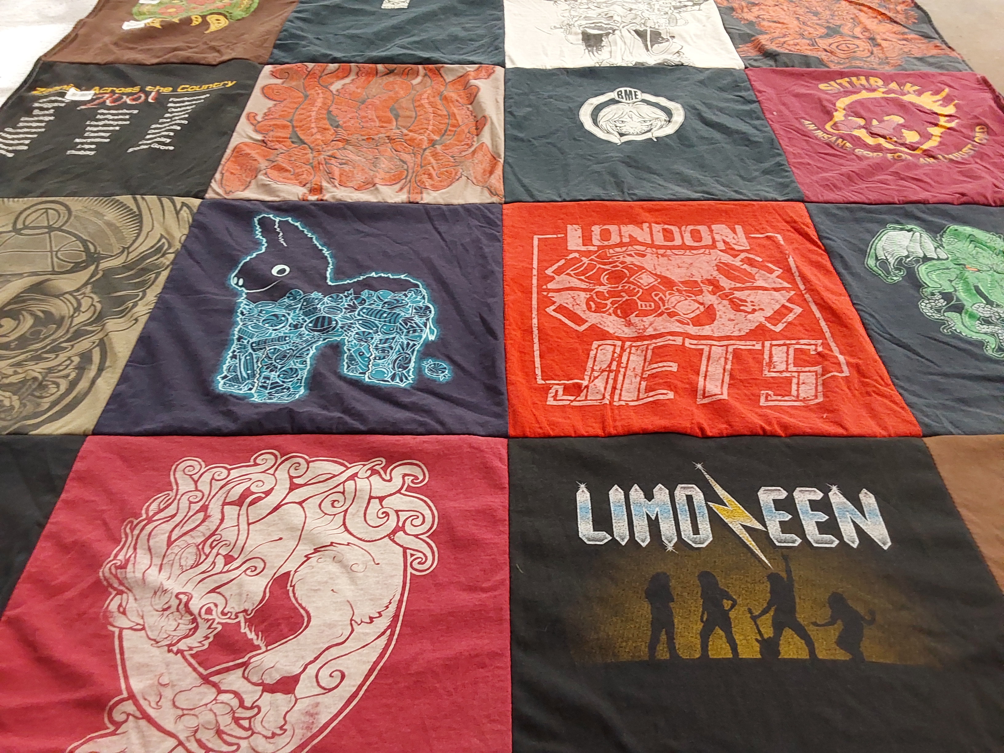 T-shirt quilt with music, art themes by Hojo from OR