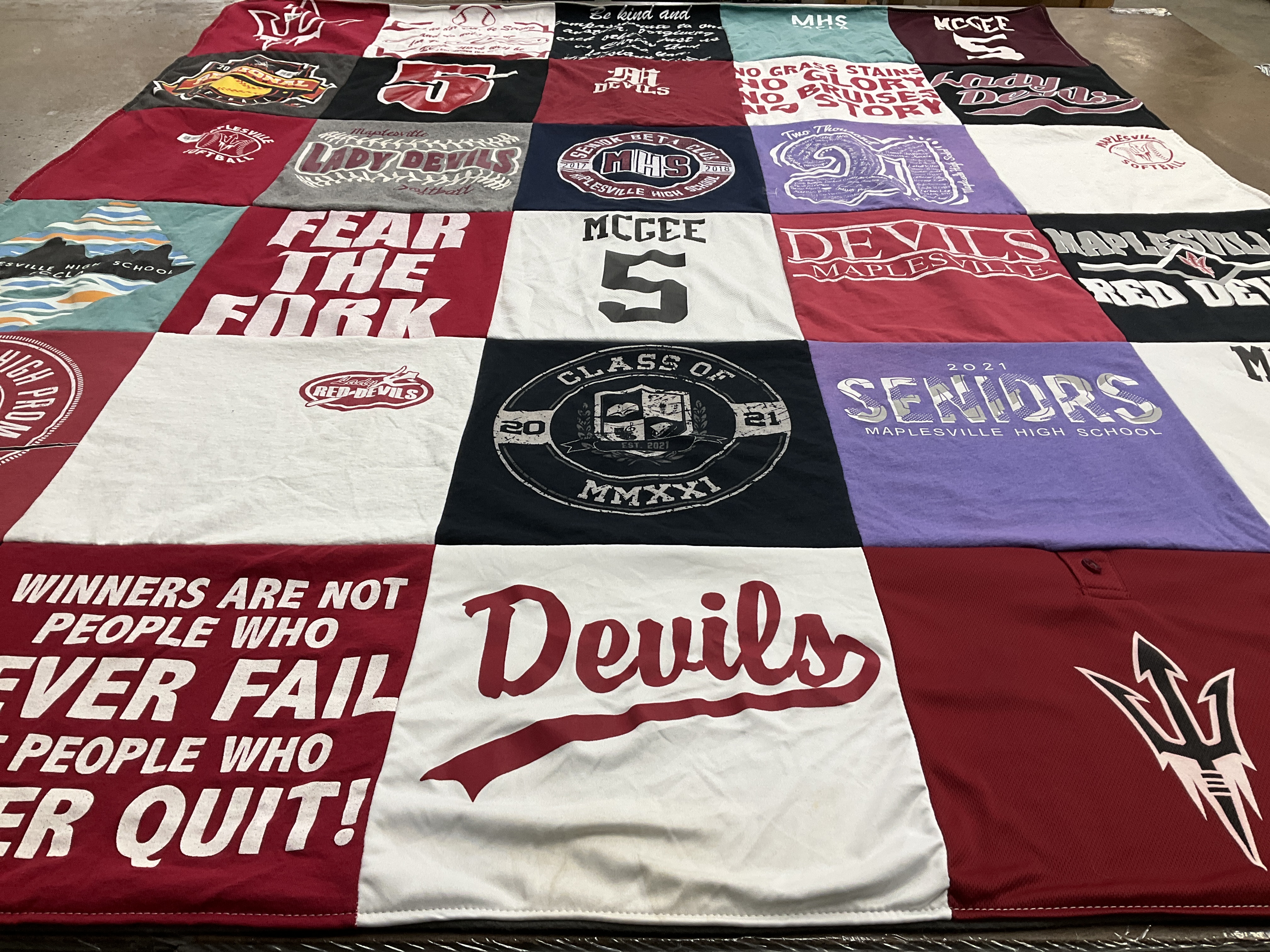 T-shirt quilt featuring lady devils, red devils by Angela from AL