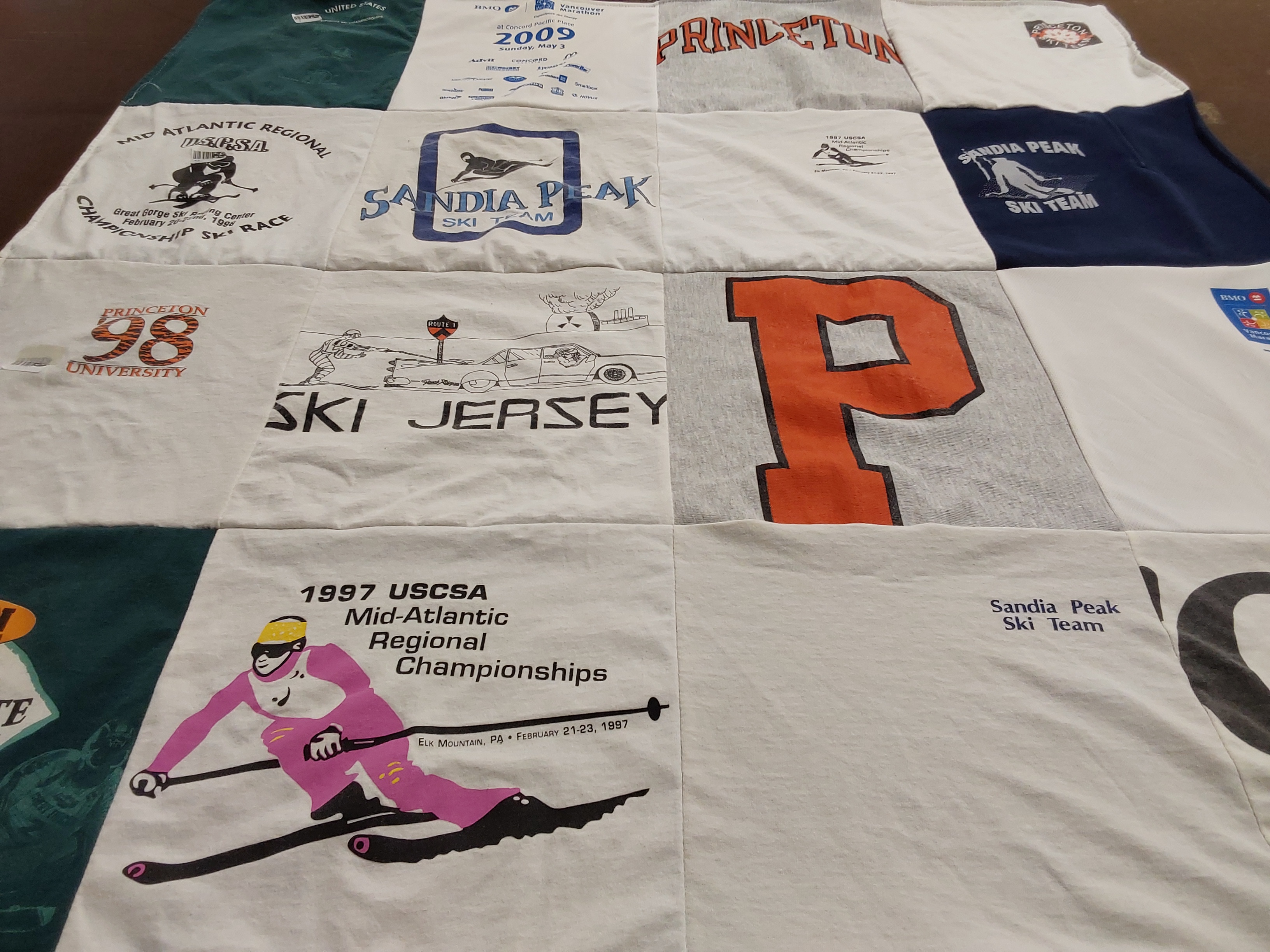 T-shirt quilt featuring sandia peak ski team by Meeko from NM