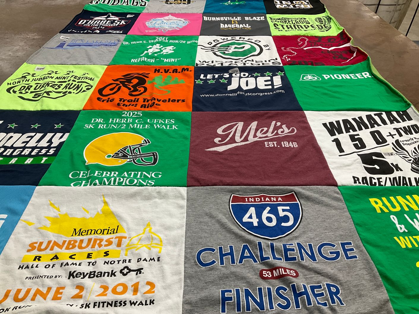 T-shirt quilt with running, walking themes by Mary from IN