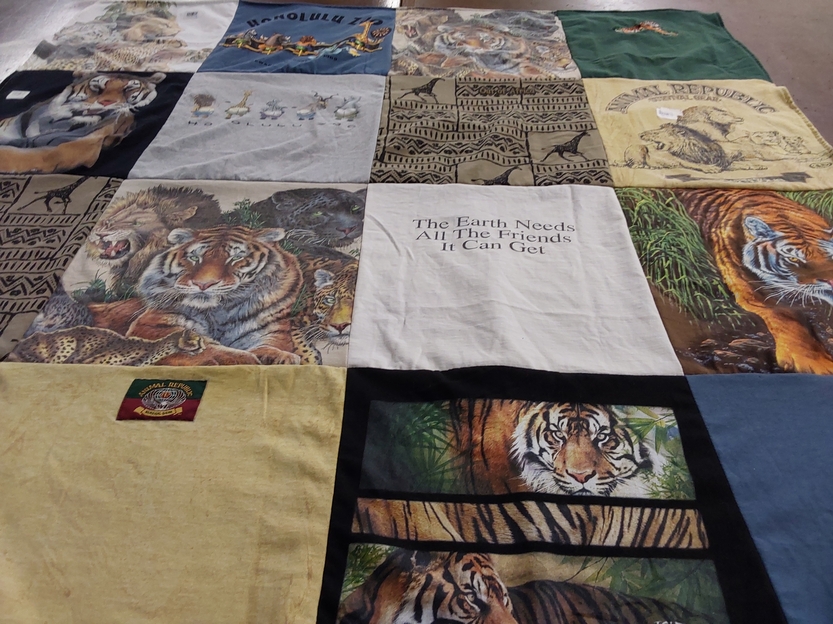 T-shirt quilt with wildlife, animal conservation themes by Carol from AZ