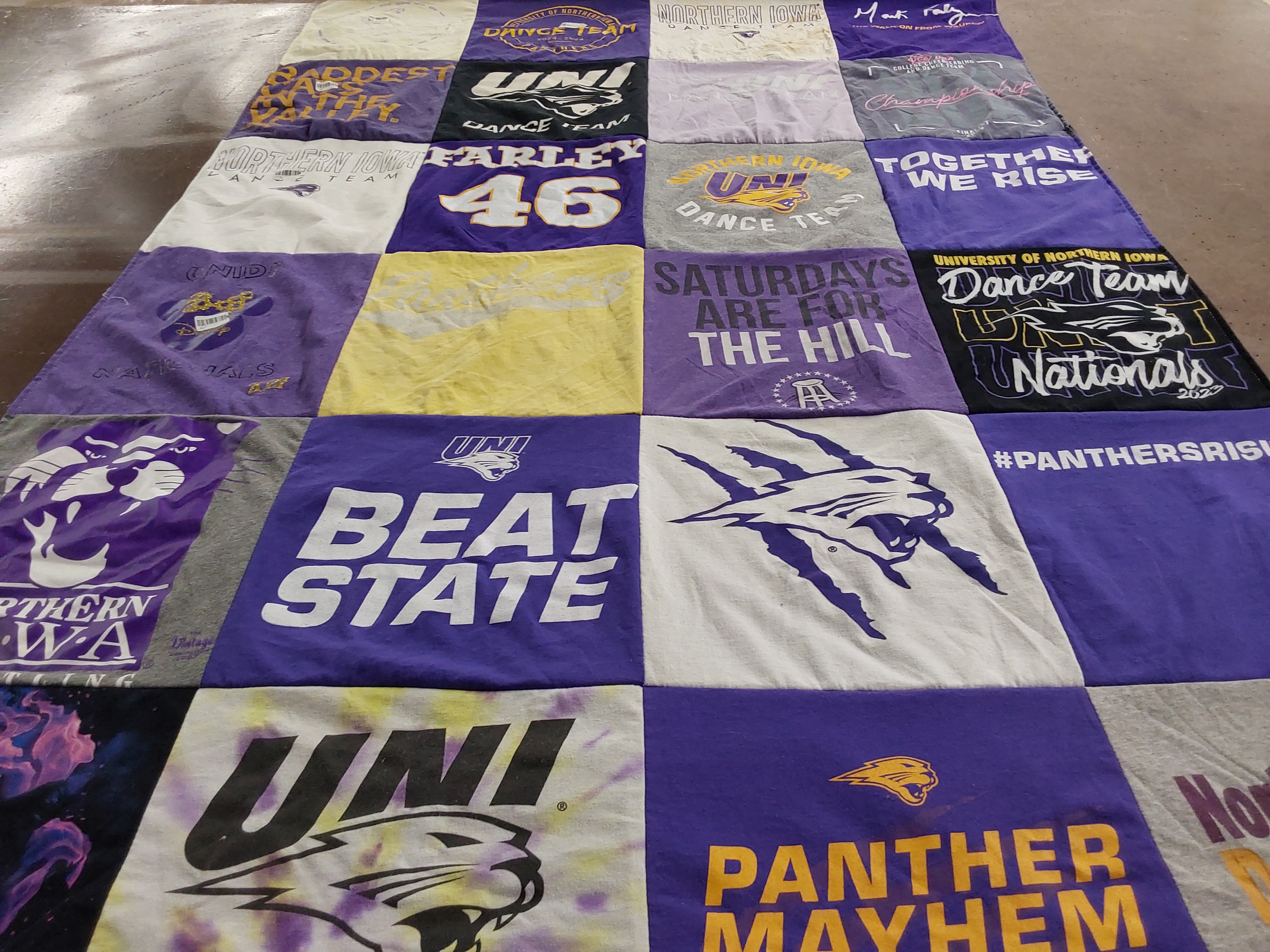 T-shirt quilt featuring northern iowa wrestling, university of northern iowa dance team by Jessica from IL
