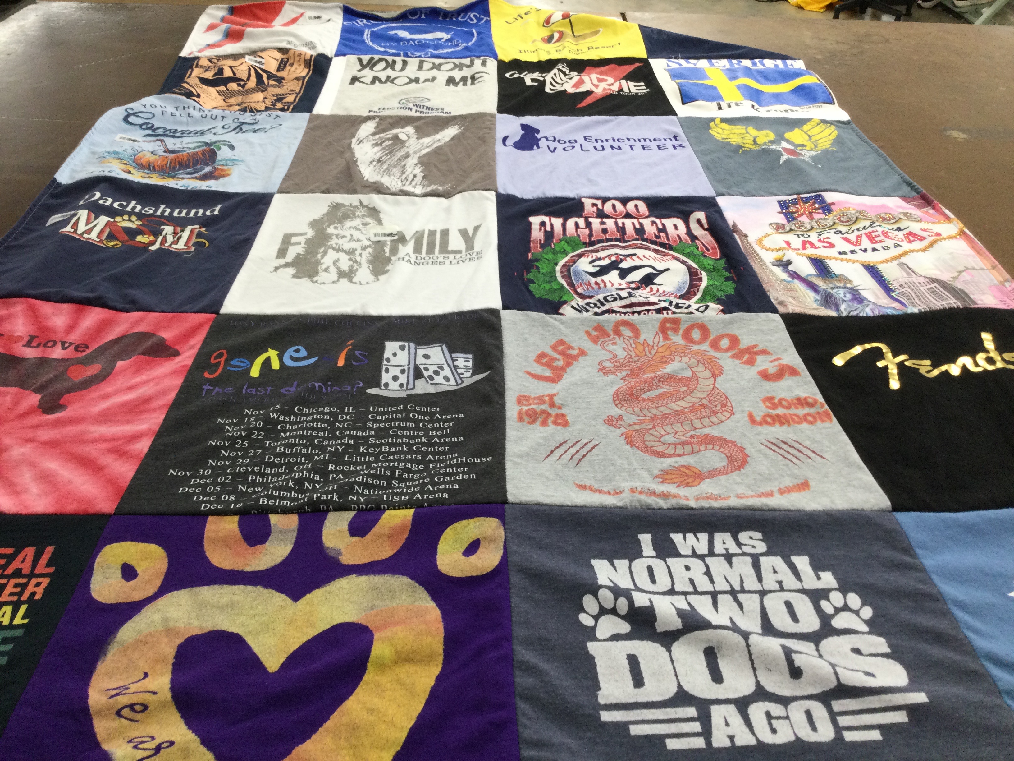 T-shirt quilt with dogs, music themes by Kathie from IL