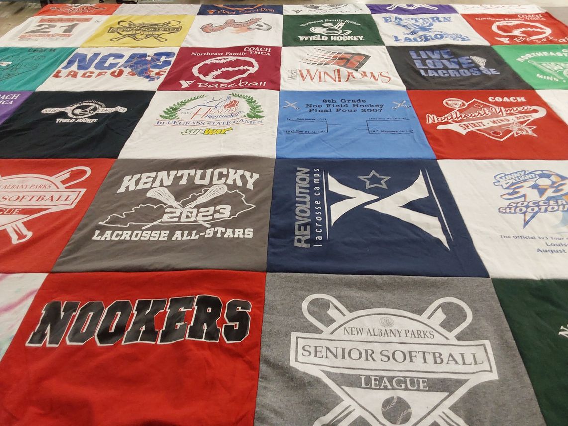 T-shirt quilt with lacrosse, softball themes by Dean from KY
