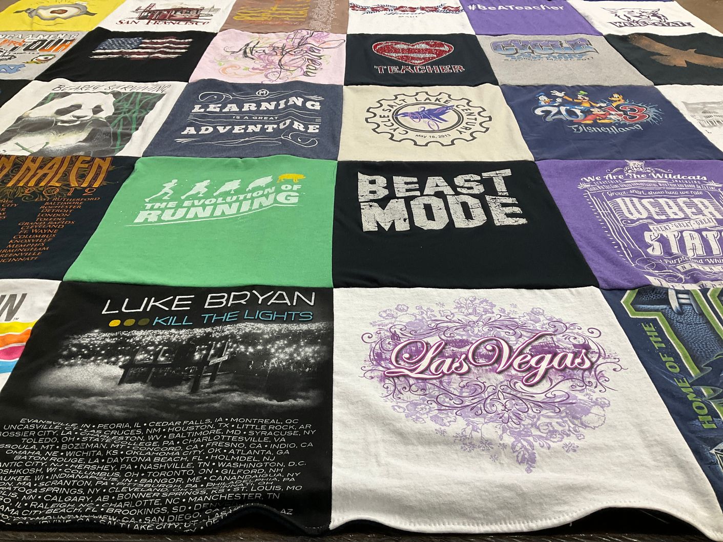 T-shirt quilt with travel, music themes by Phillip from UT