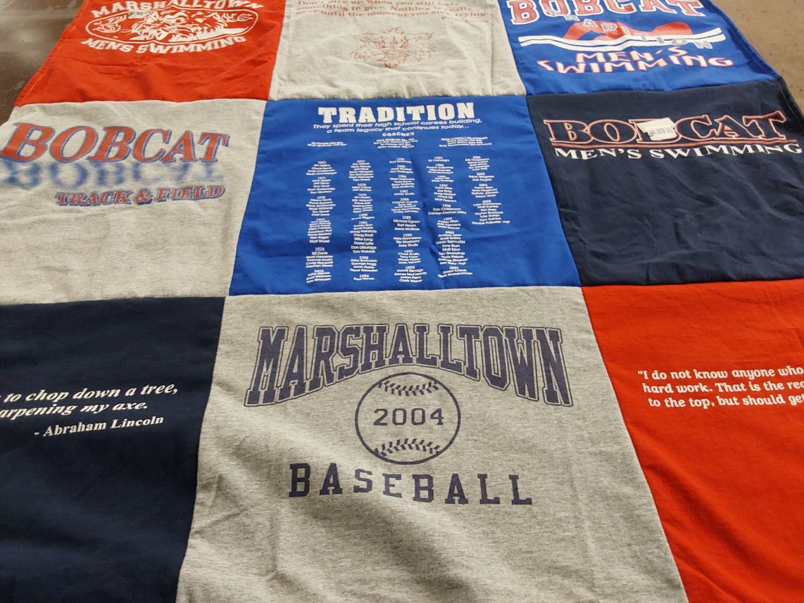 T-shirt quilt featuring bobcat men's swimming by Robert from IA