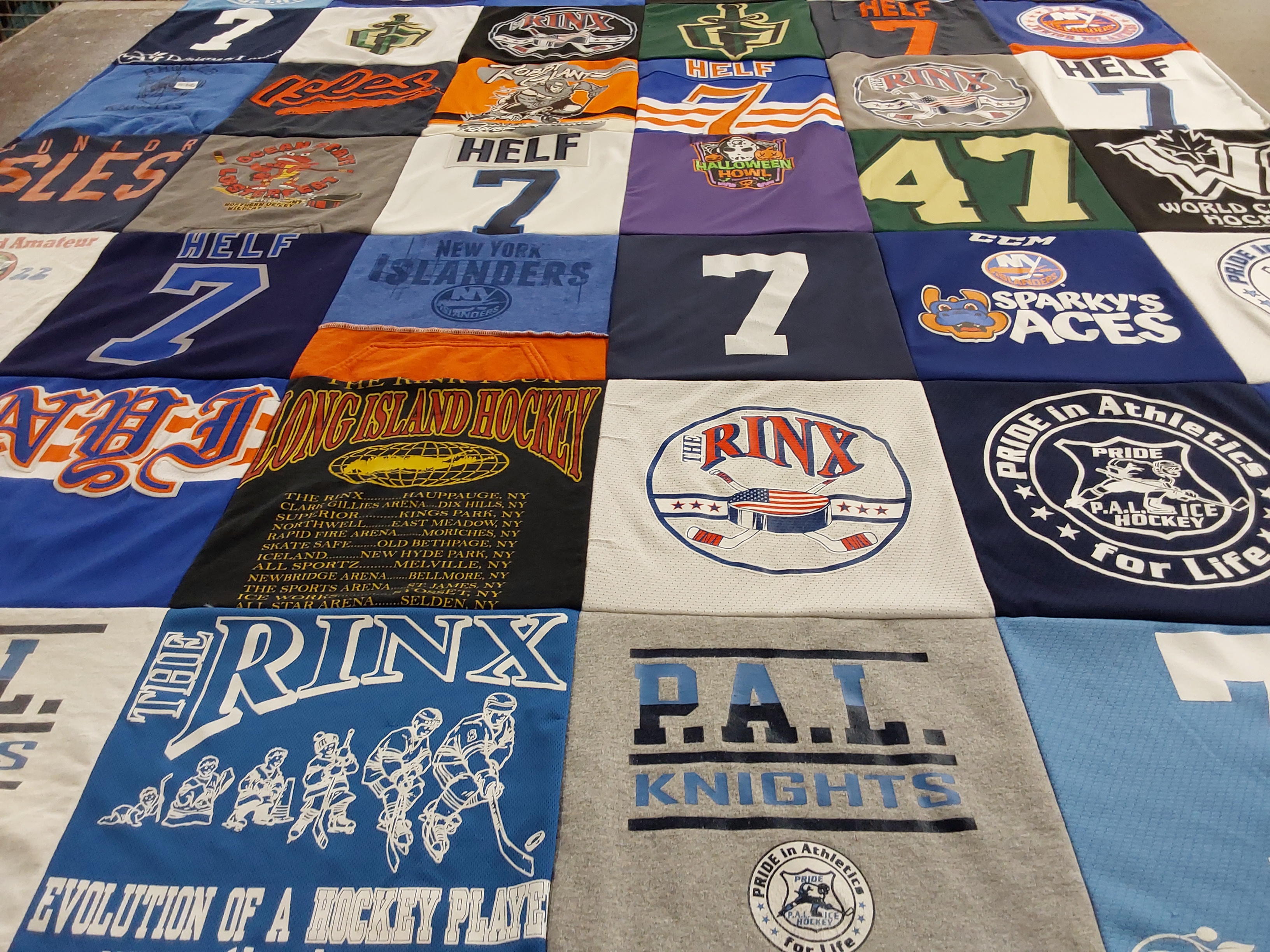 T-shirt quilt with hockey, sports themes by Nicole from NY