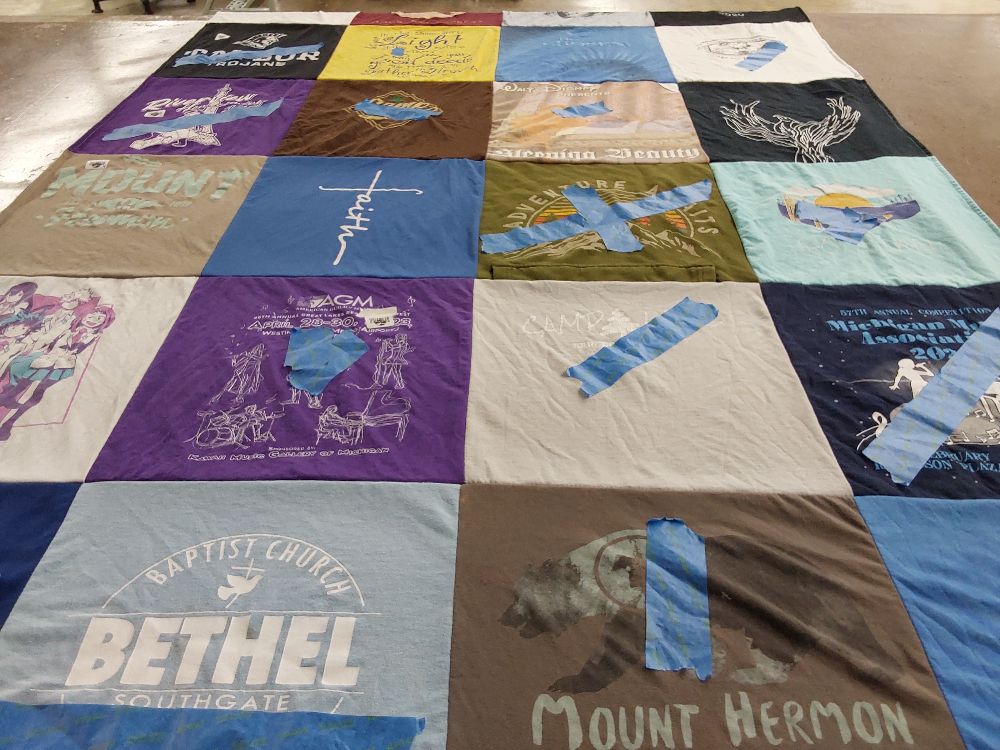T-shirt quilt with camping, youth groups themes by Jennifer from MI