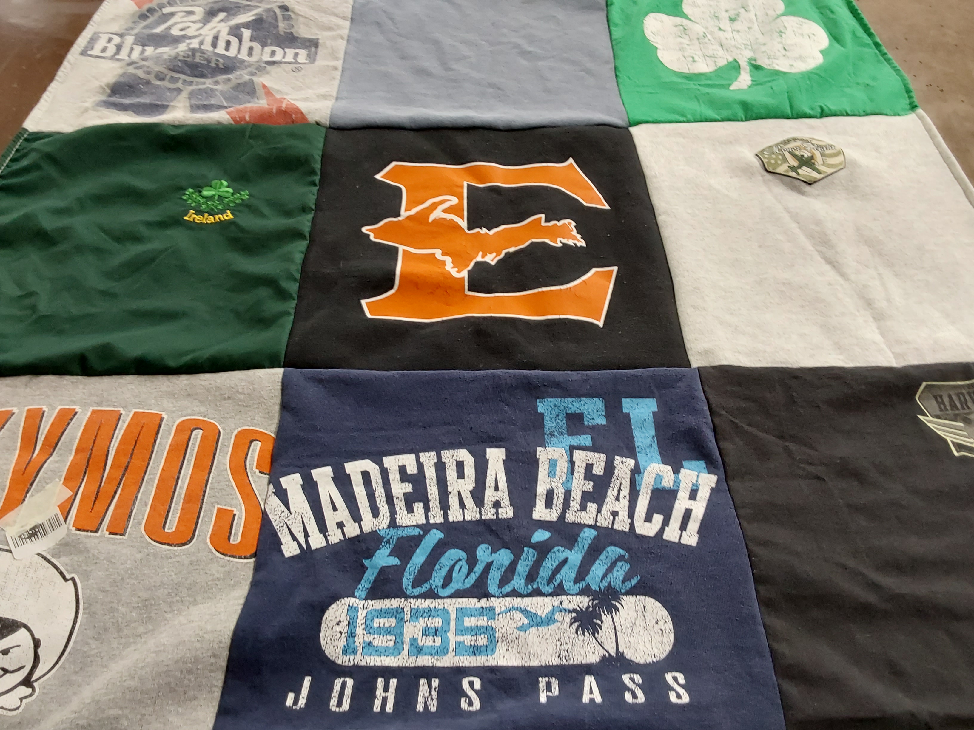 T-shirt quilt with travel, beach themes by Jennifer from WI