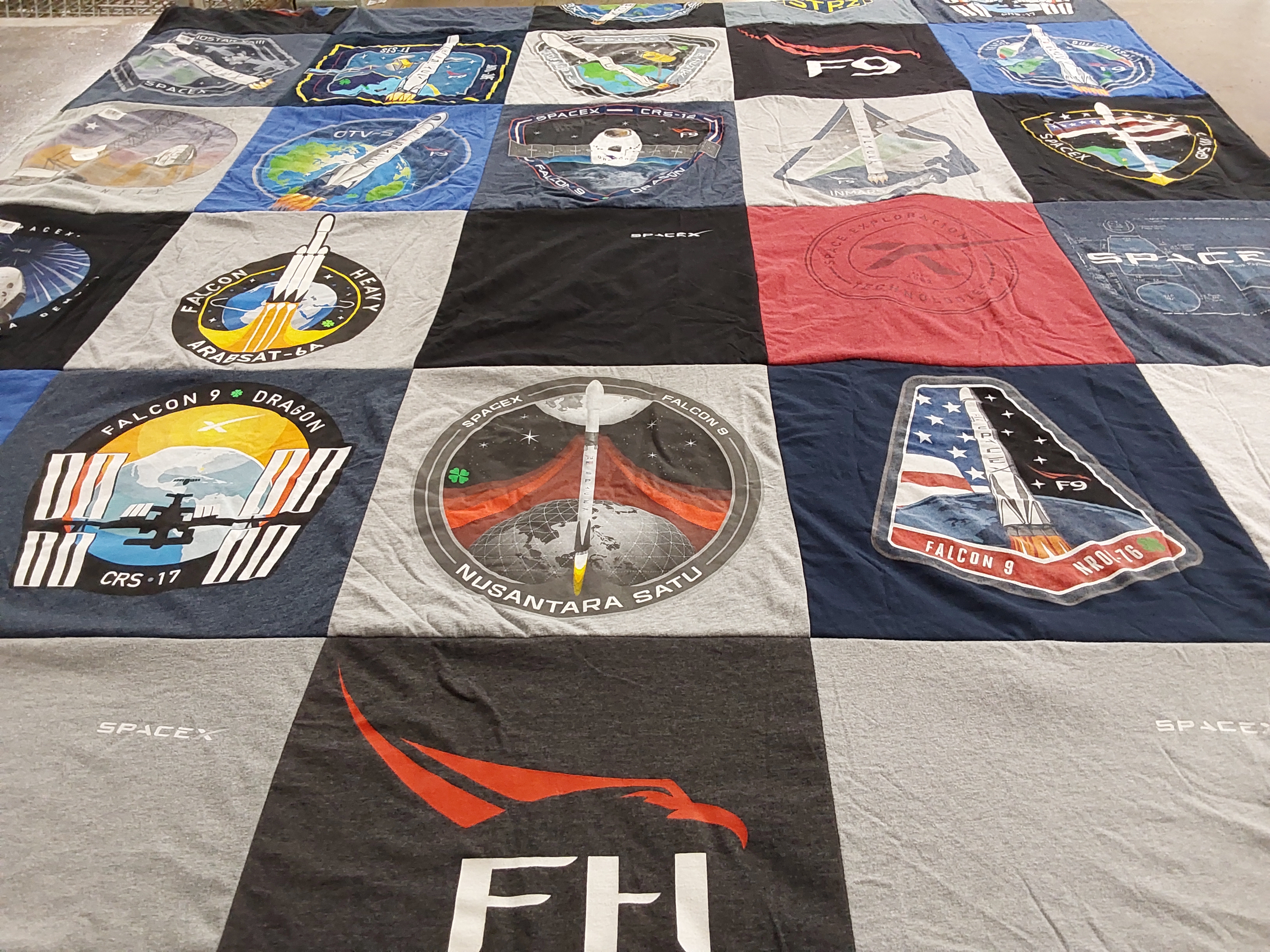 T-shirt quilt with space exploration, rocketry themes by Kelsey from TX
