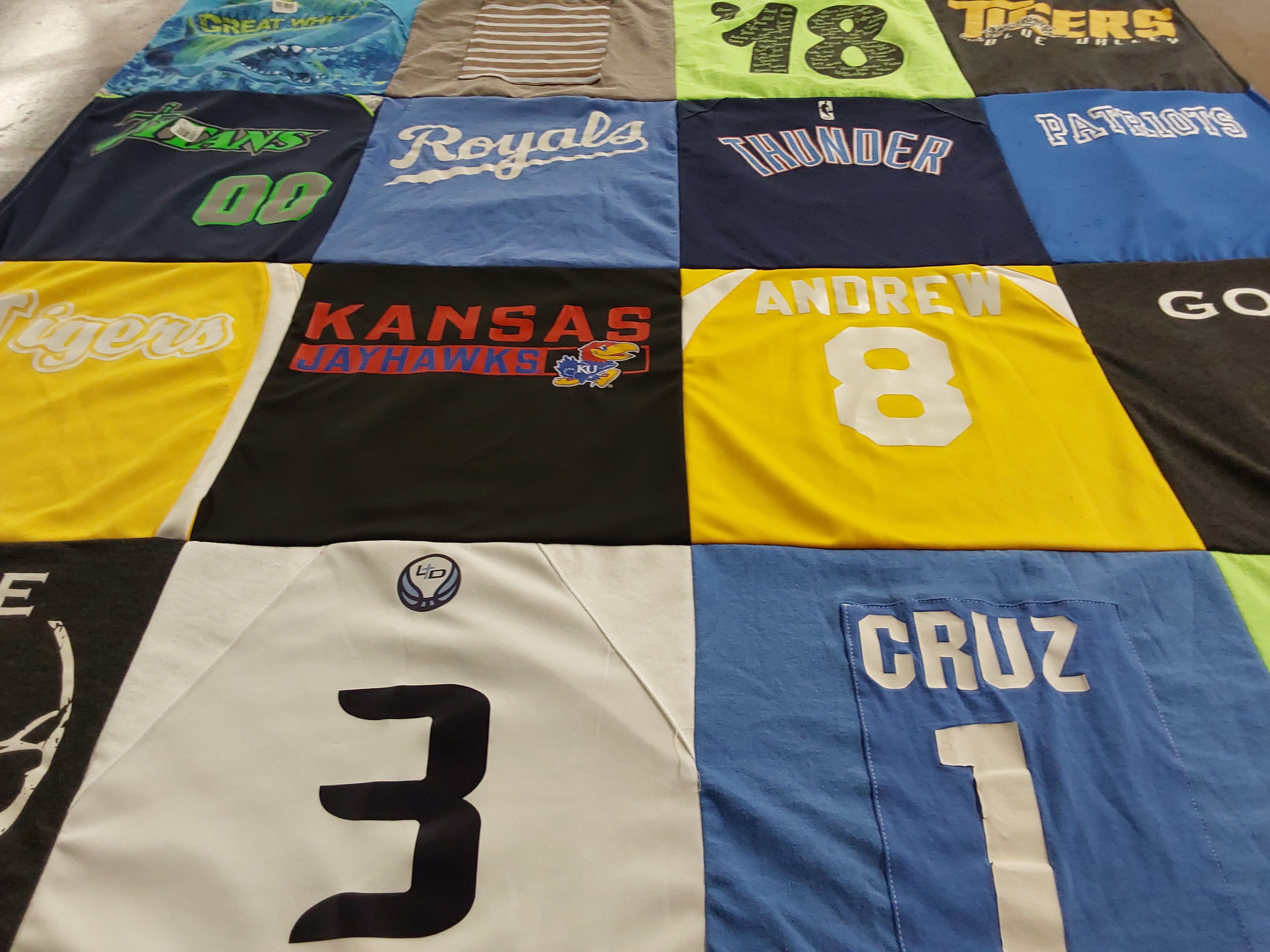 T-shirt quilt featuring ku jayhawks, oklahoma city thunder by Julie from KS