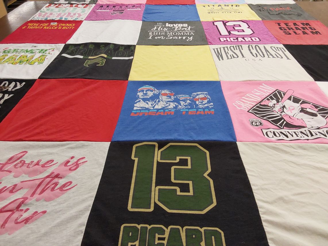 T-shirt quilt with sports, social gatherings themes by Sarah from MO