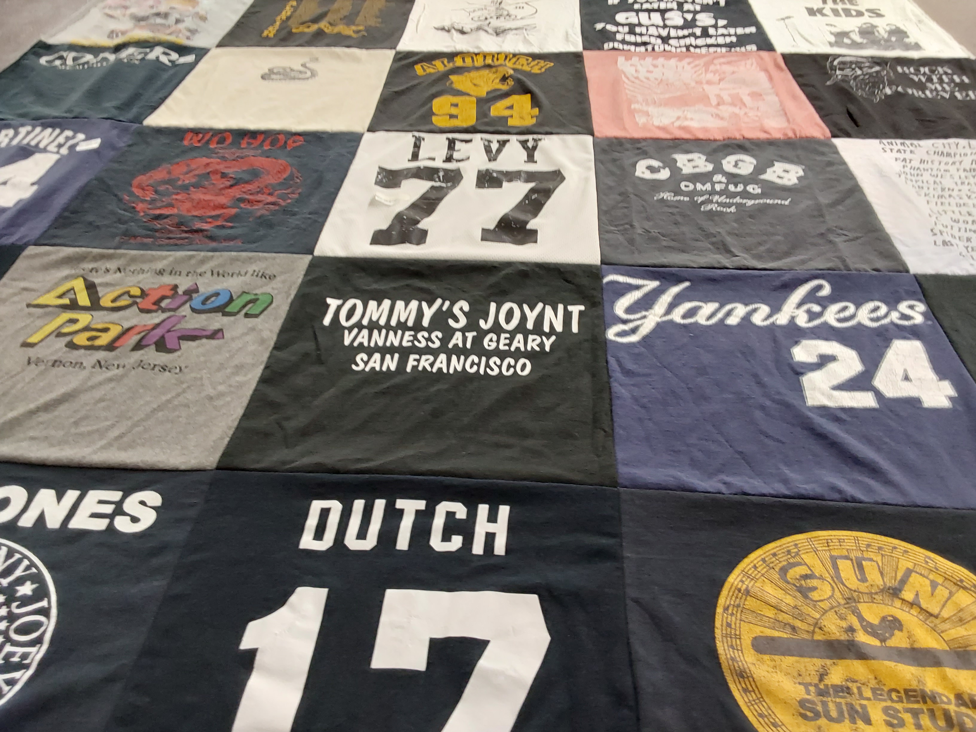 T-shirt quilt with amusement parks, sports themes by Dave from FL