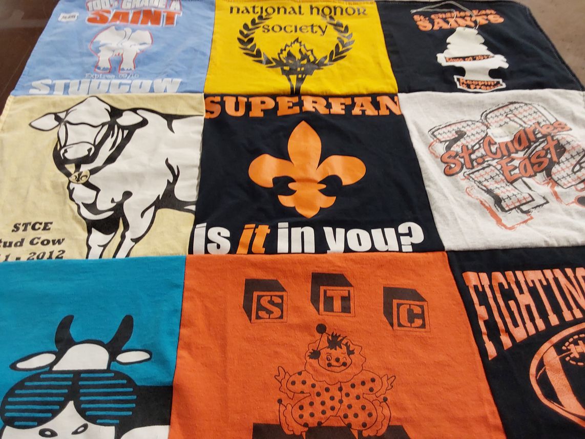 T-shirt quilt from st. charles east high school by Laura from CO