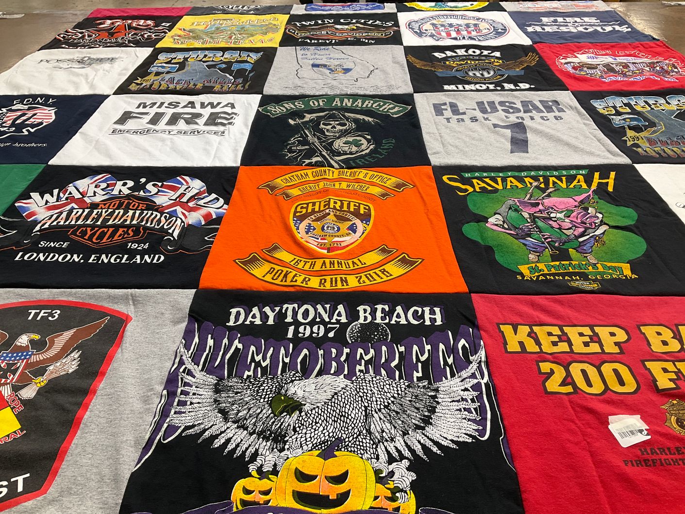 T-shirt quilt with motorcycles, firefighting themes by Vicki from GA