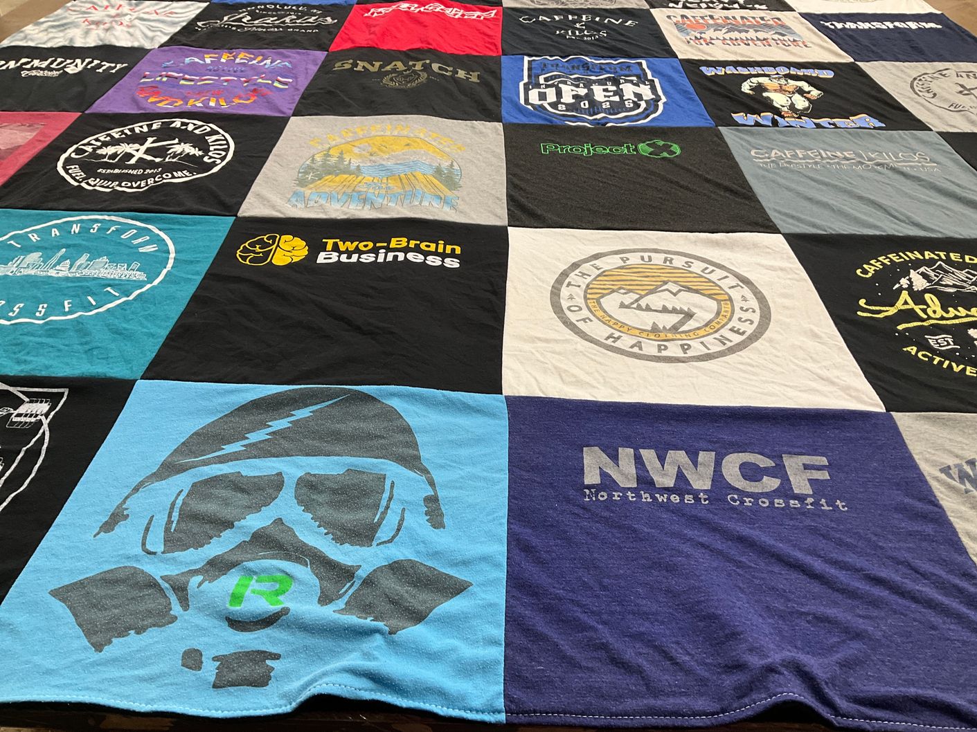 T-shirt quilt with fitness, wellness themes by Jaime from WA