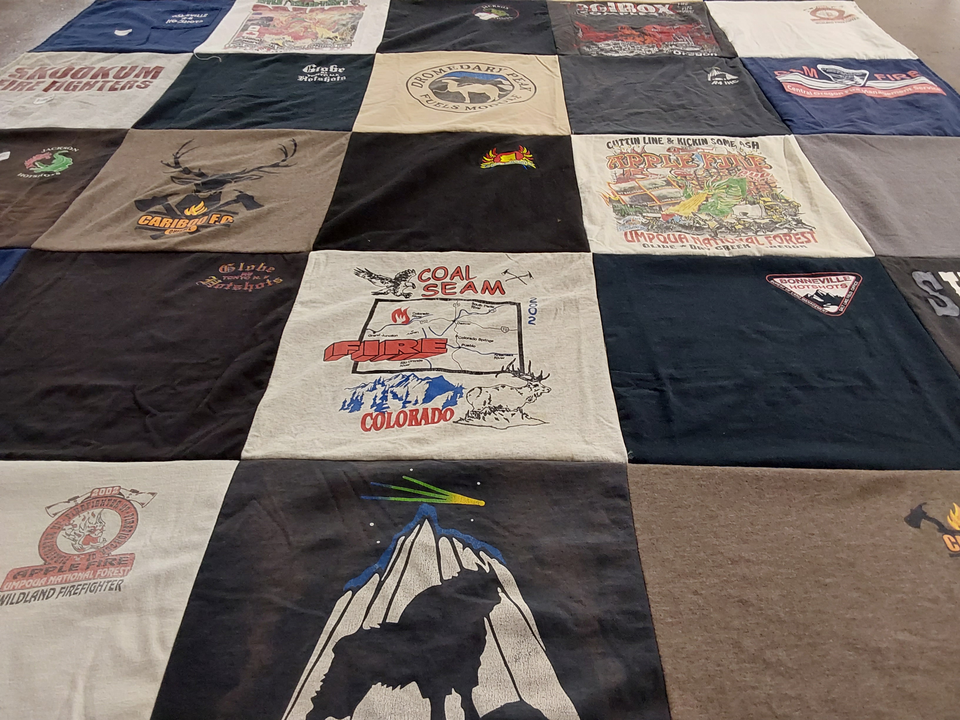T-shirt quilt with firefighting, outdoors themes by Kathe from OR