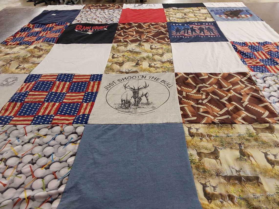 T-shirt quilt with hunting, sports themes by Claudia from UT