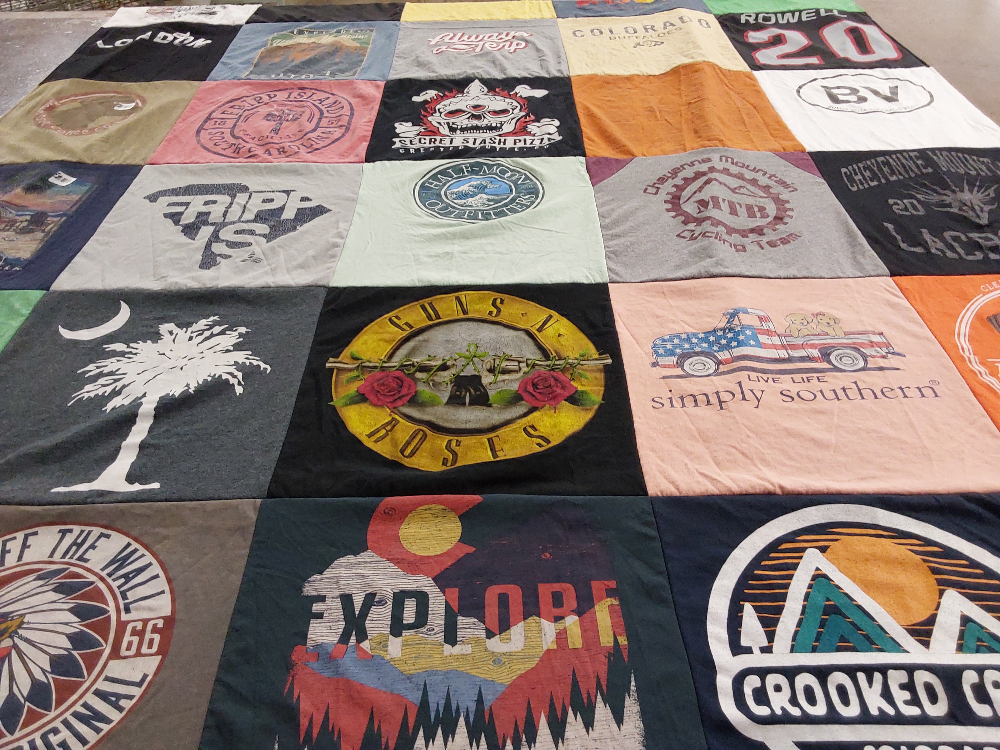 T-shirt quilt featuring cheyenne mountain cycling team by lara from CO