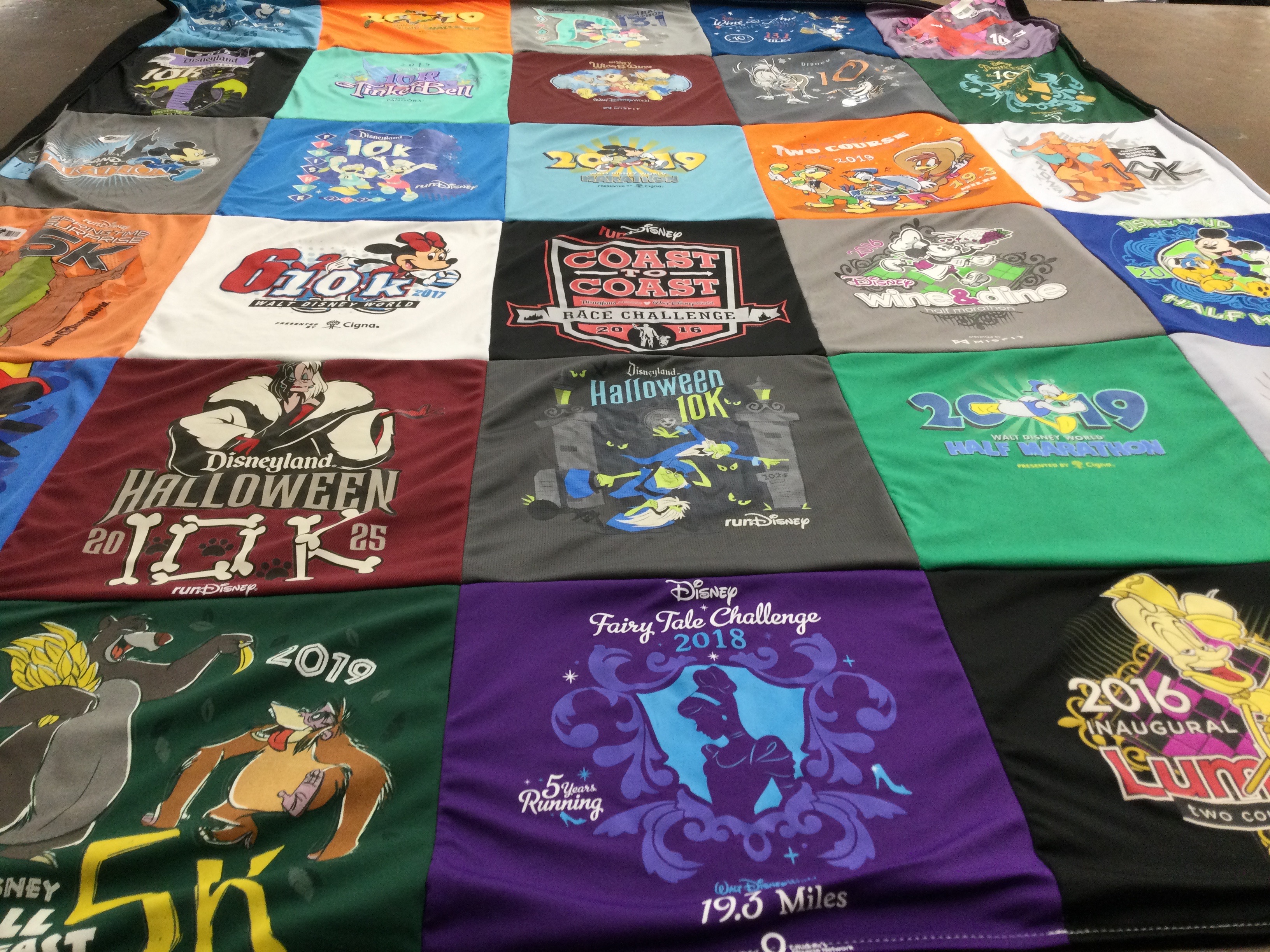 T-shirt quilt with running, disney themes by Darrell from CA