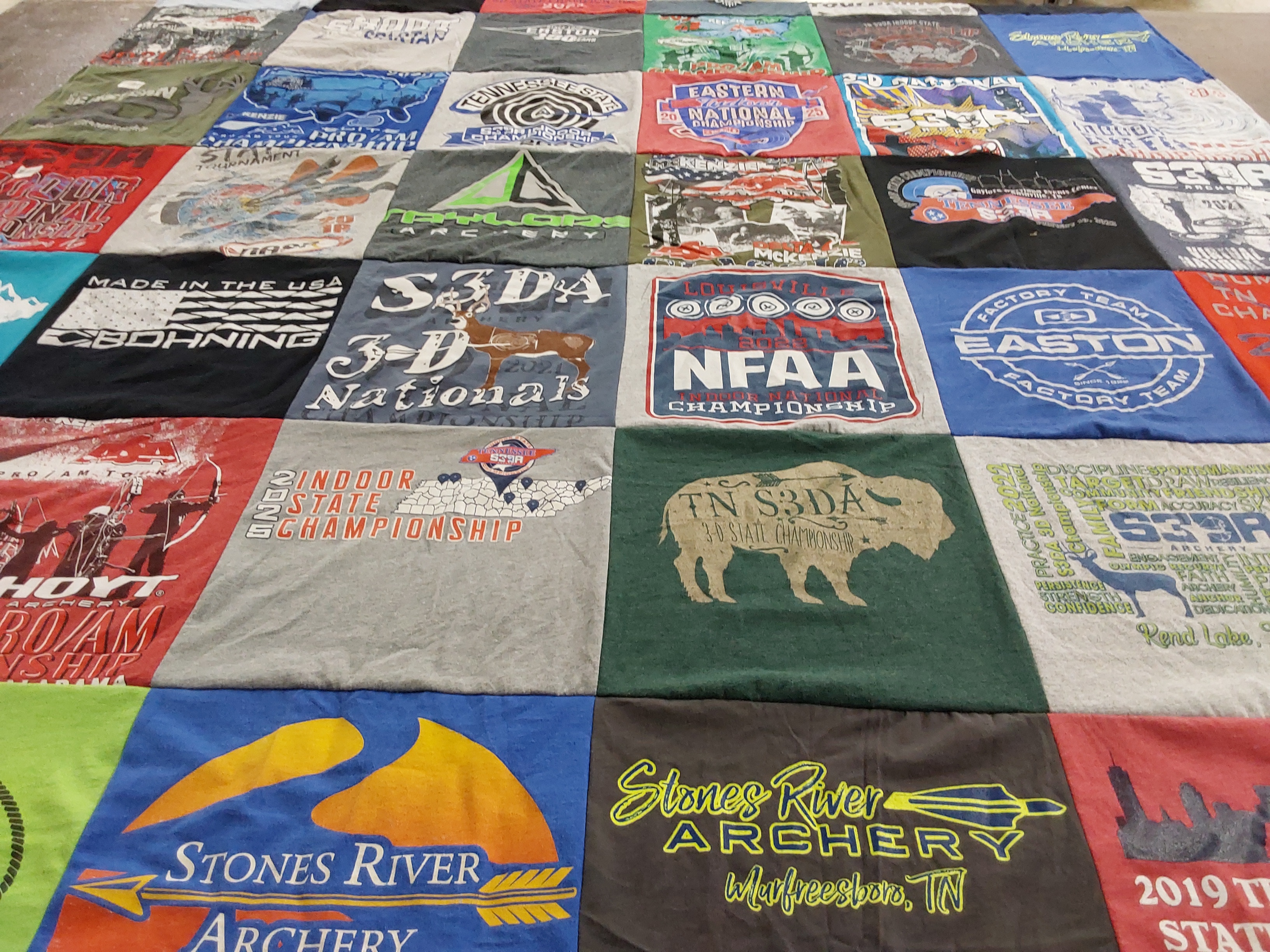 T-shirt quilt with archery, sports themes by Trista from TN