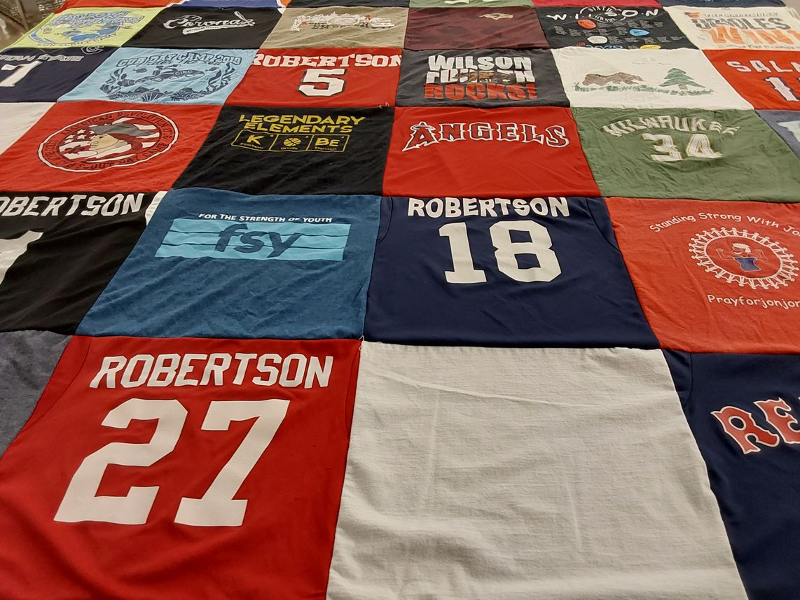 T-shirt quilt with sports, youth programs themes by Lynnley from UT