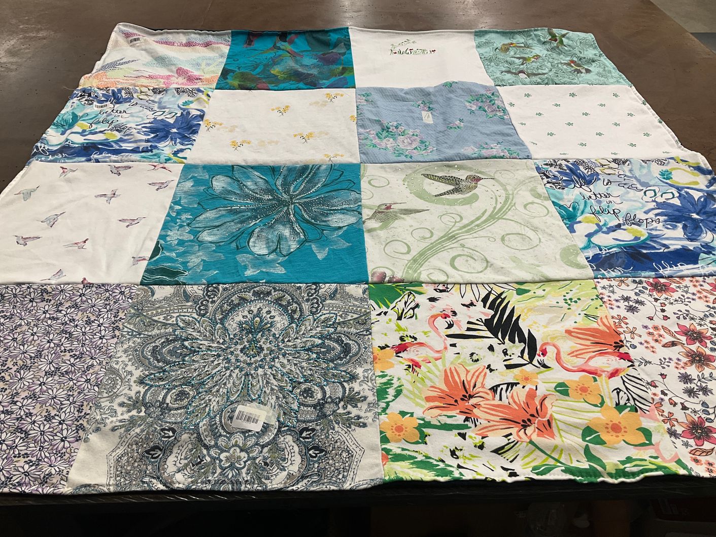 T-shirt quilt with gardening, nature themes by Kathleen from IA