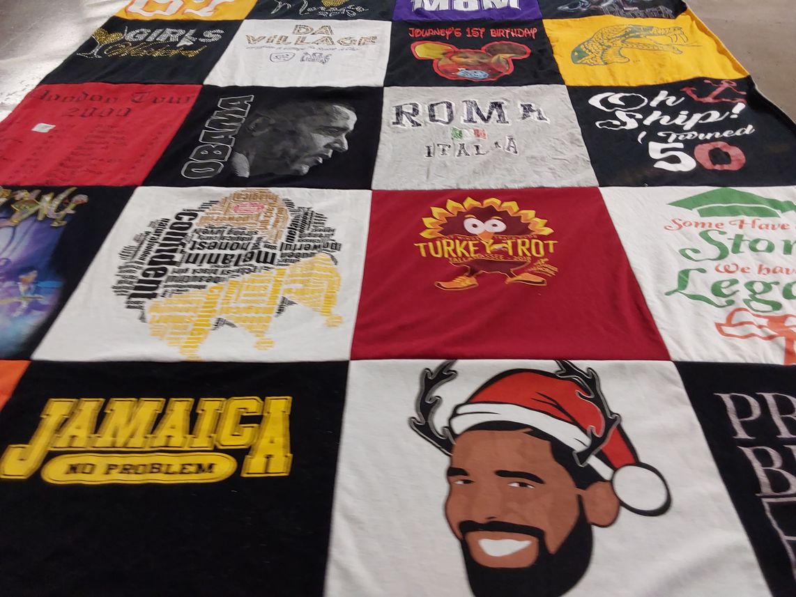 T-shirt quilt with travel, celebrations themes by Monique  from FL