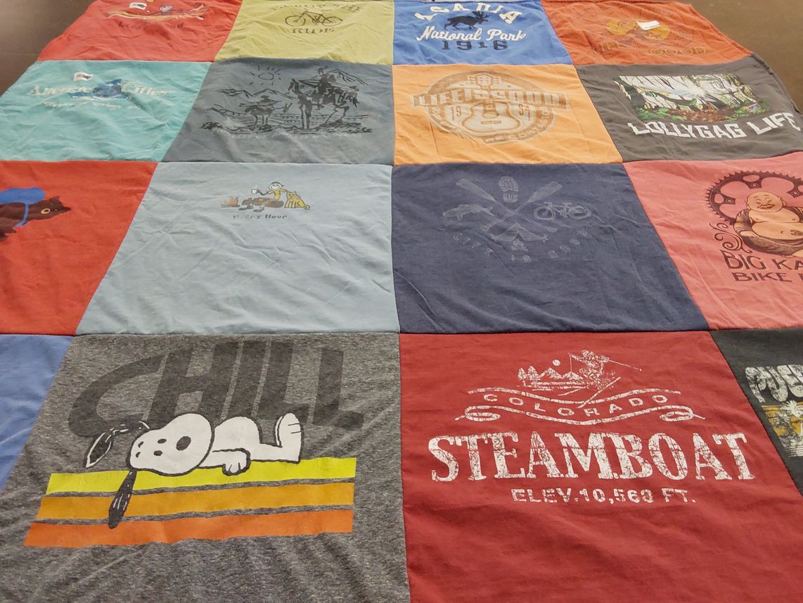 T-shirt quilt with outdoors, cycling themes by Adriana from TX