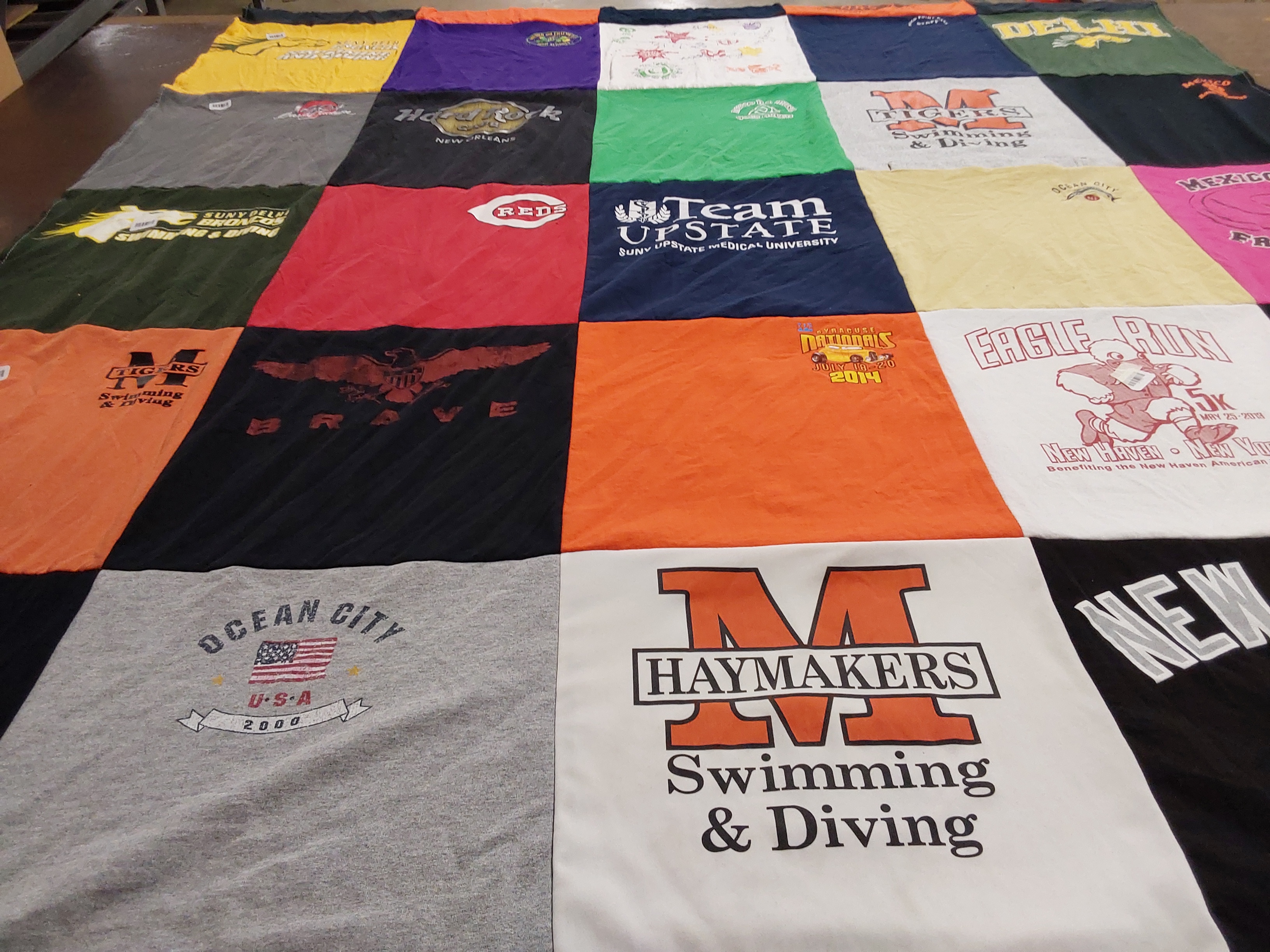 T-shirt quilt featuring haymakers swimming and diving, m tigers swimming and diving by Lois from NY